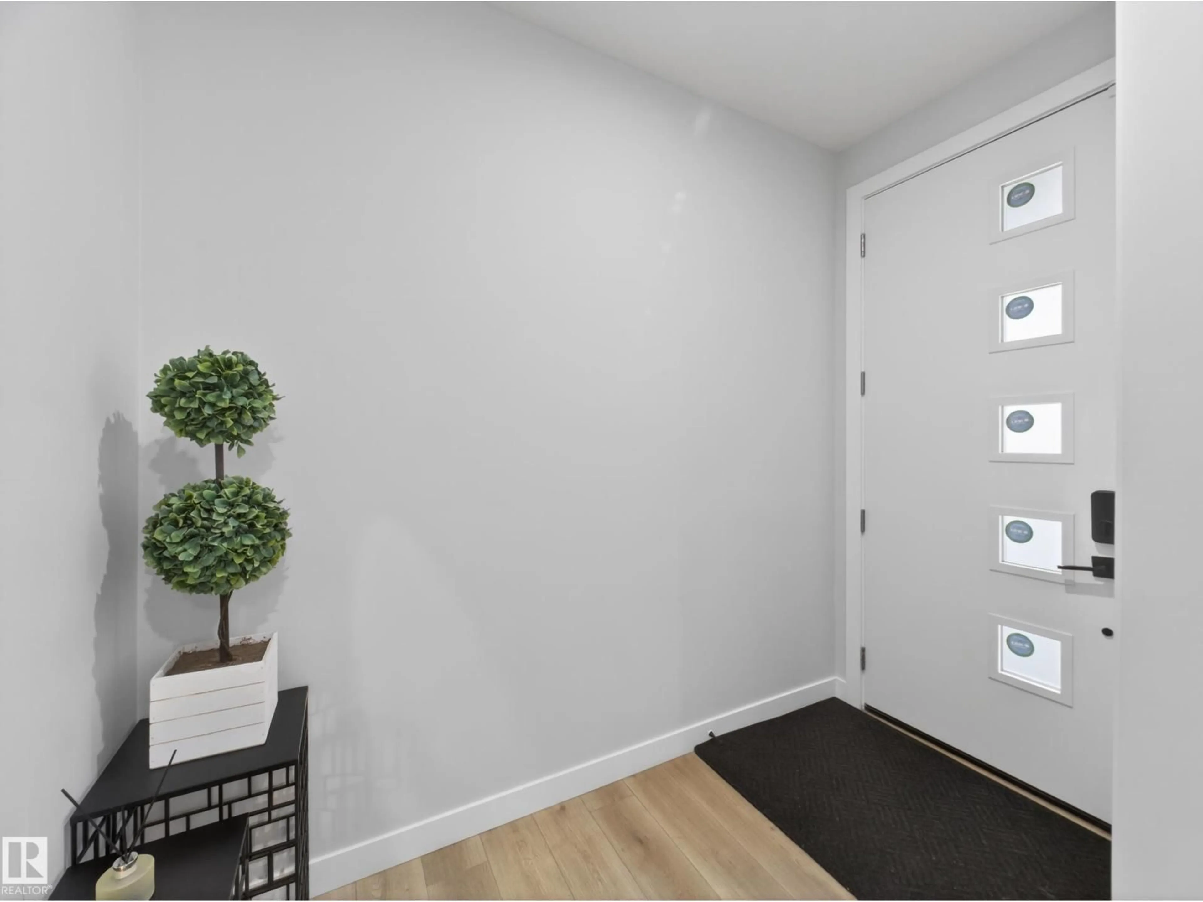 Indoor entryway for 19744 28 AV, Edmonton Alberta T6M1M1