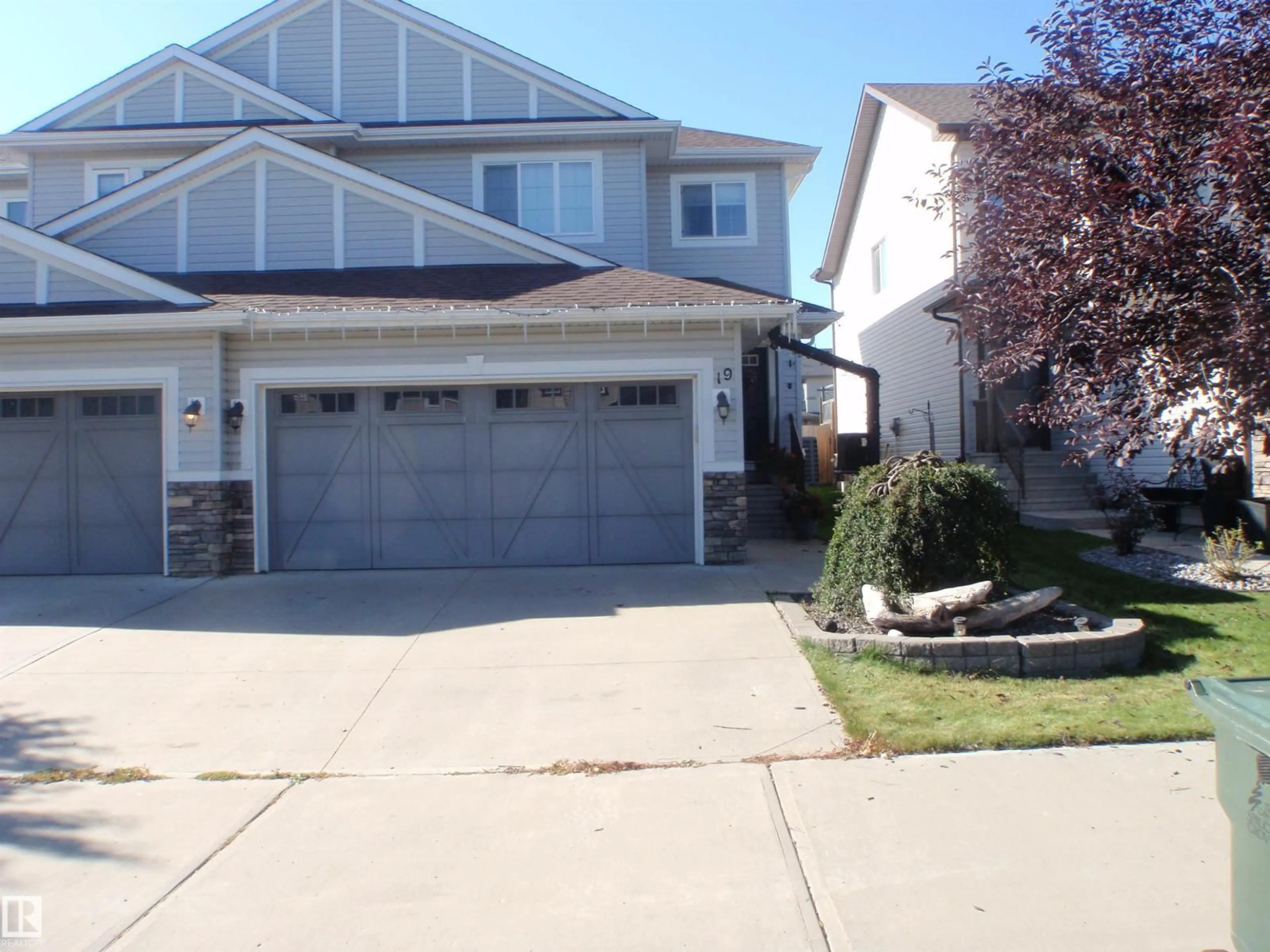Home with vinyl exterior material, street for 19 HALLADAY BV, Spruce Grove Alberta T7X0P5