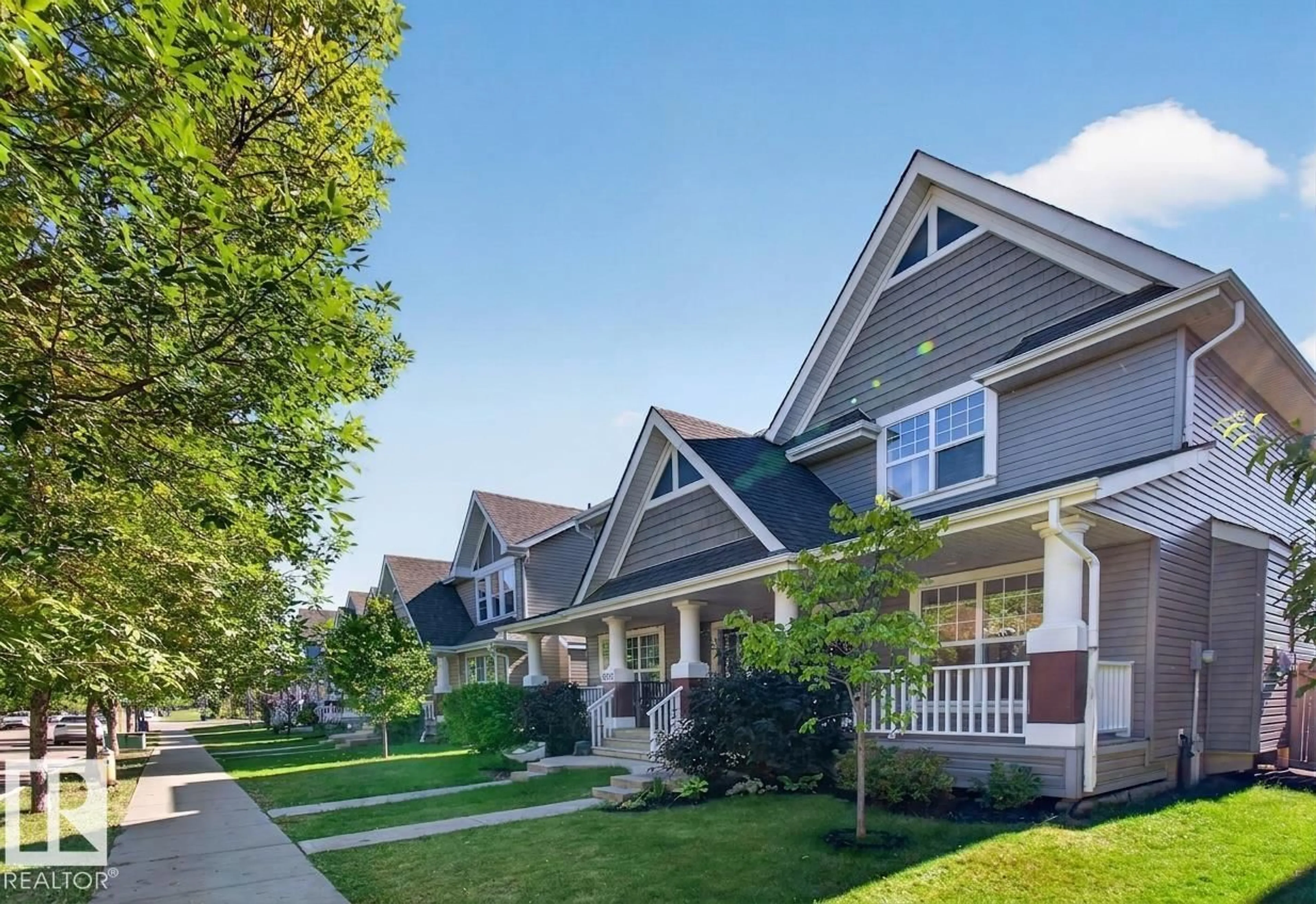 Home with vinyl exterior material, street for 6933 21A AV, Edmonton Alberta T6X0T6