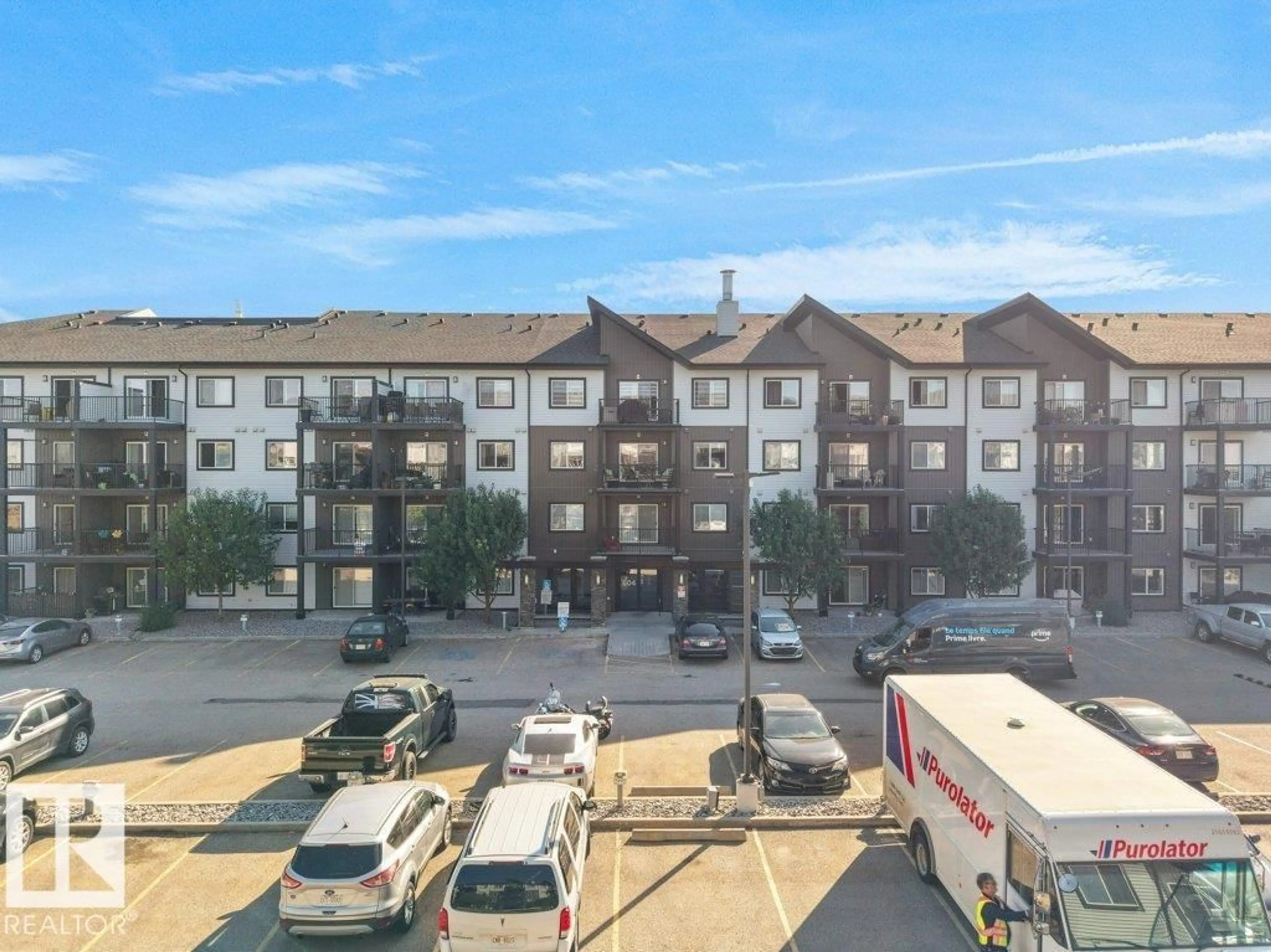 A pic from outside/outdoor area/front of a property/back of a property/a pic from drone, city buildings view from balcony for 504 - 229 ALBANY WY, Edmonton Alberta T6V0L2