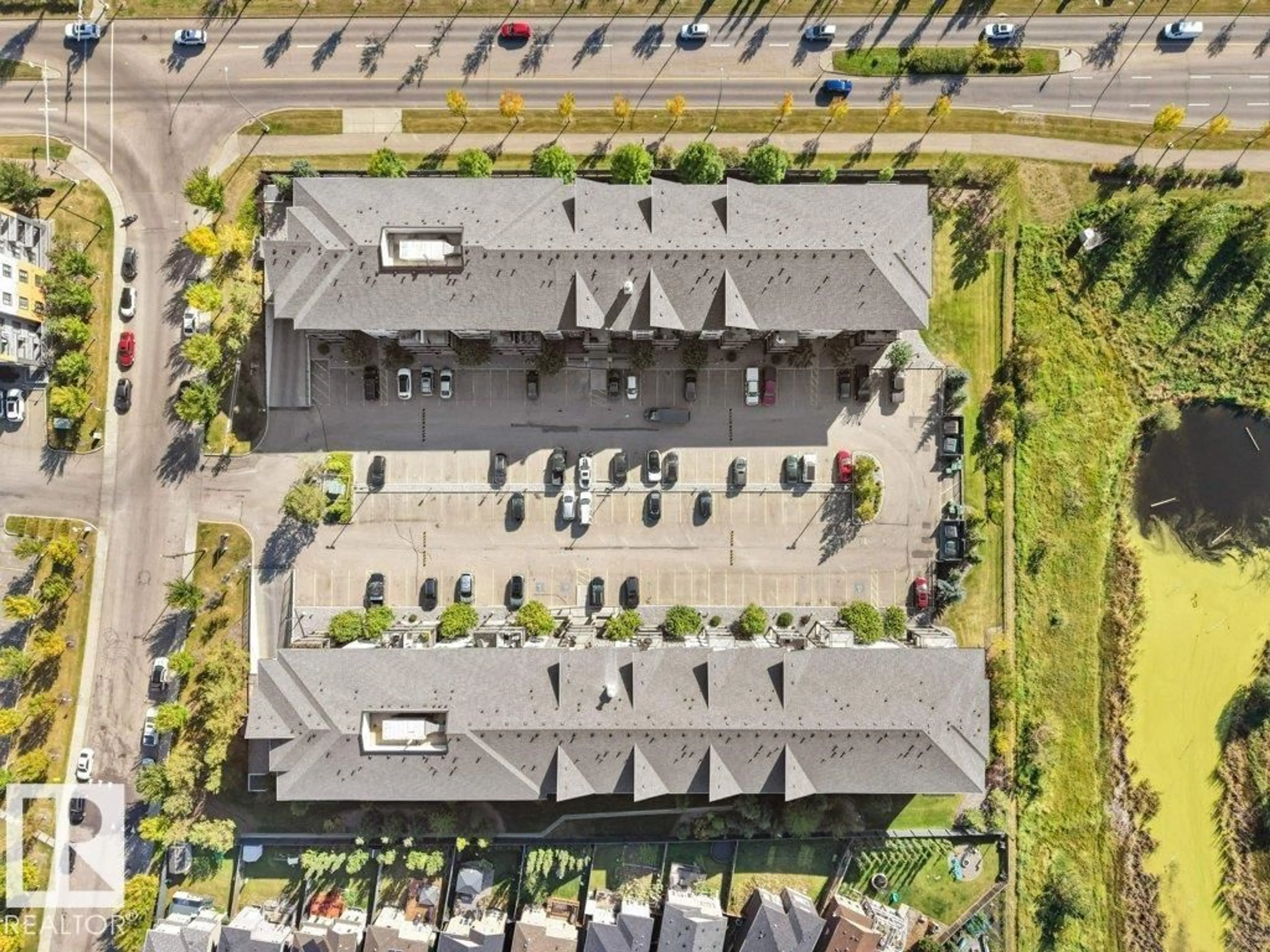 A pic from outside/outdoor area/front of a property/back of a property/a pic from drone, street for 504 - 229 ALBANY WY, Edmonton Alberta T6V0L2