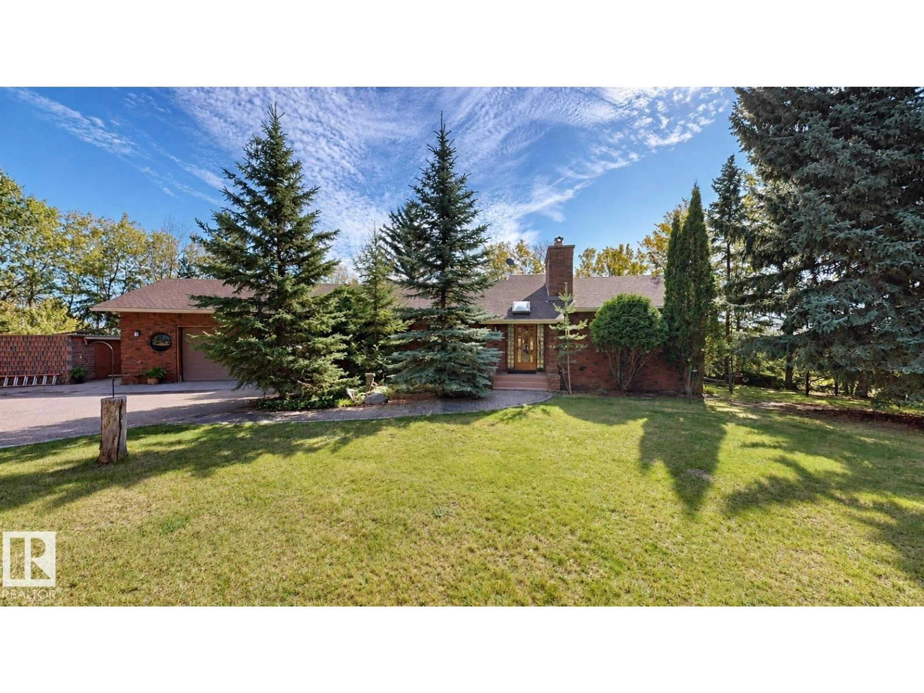 A pic from outside/outdoor area/front of a property/back of a property/a pic from drone, mountain view for 29 55312 RGE ROAD 241, Rural Sturgeon County Alberta T8T1X6
