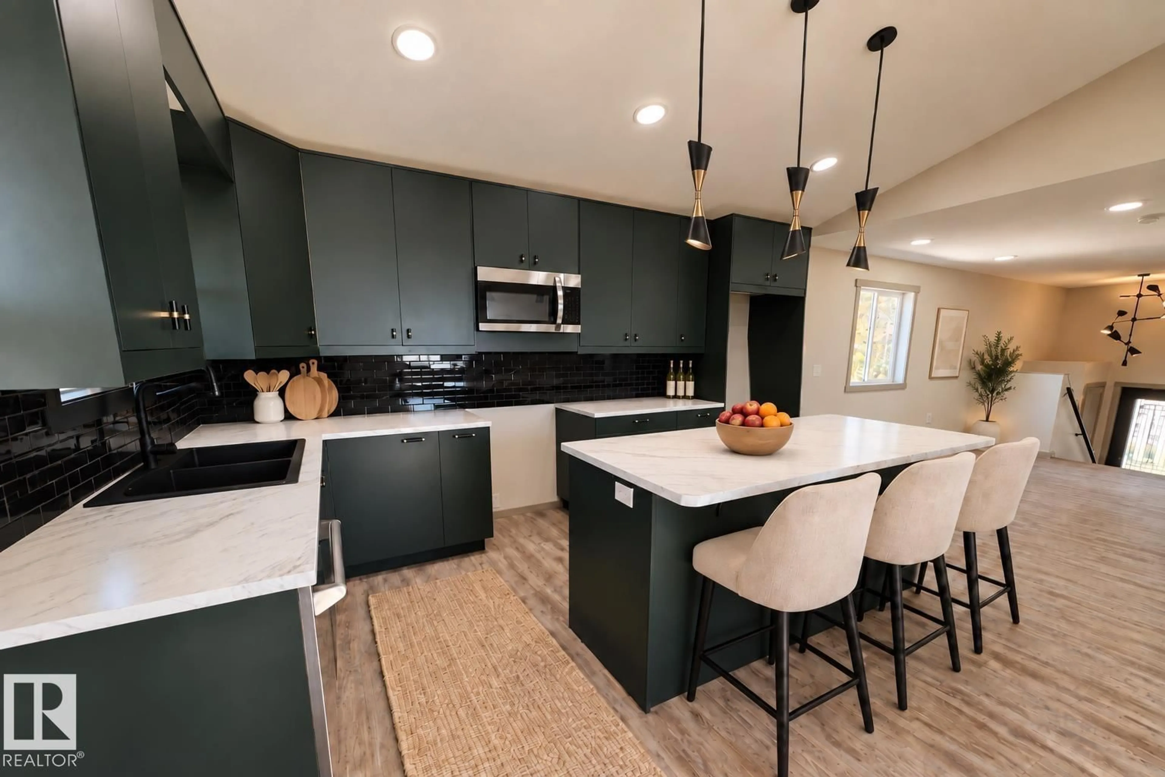 Open concept kitchen, ceramic/tile floor for 27 WHITETAIL CV, Mundare Alberta T0B3H0