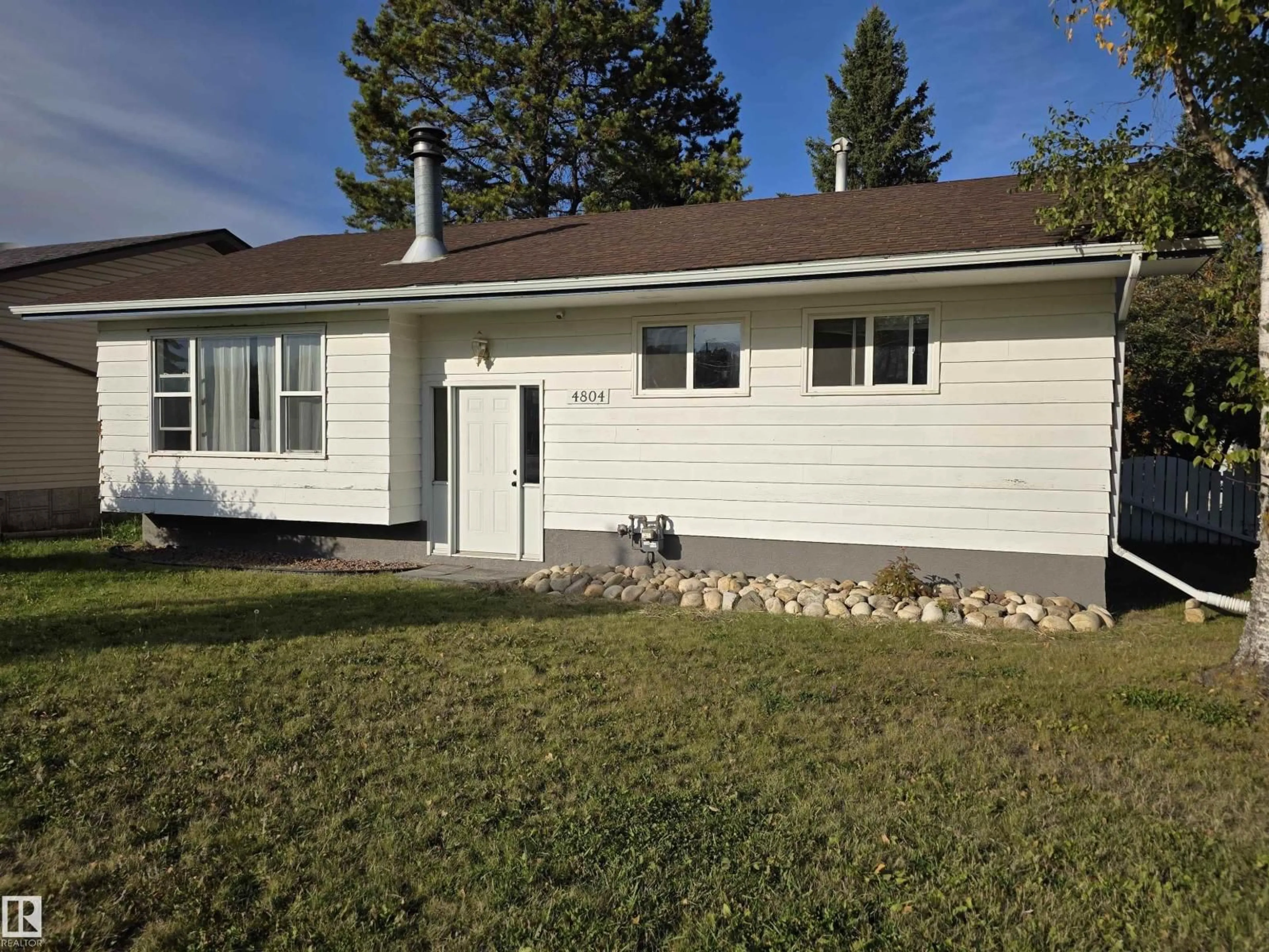 Home with vinyl exterior material, street for 4804 55 AV, Drayton Valley Alberta T7A1B5