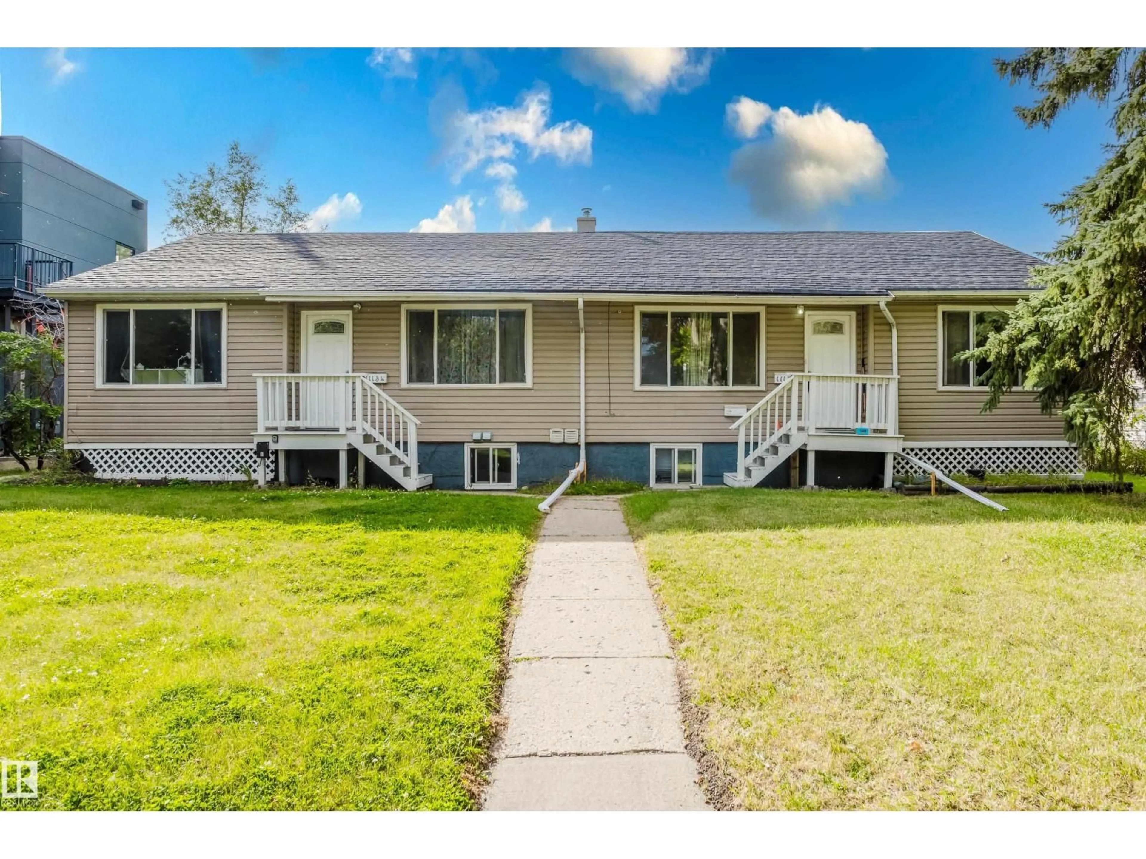 Home with vinyl exterior material, street for 11134 116 ST, Edmonton Alberta T5G2V8