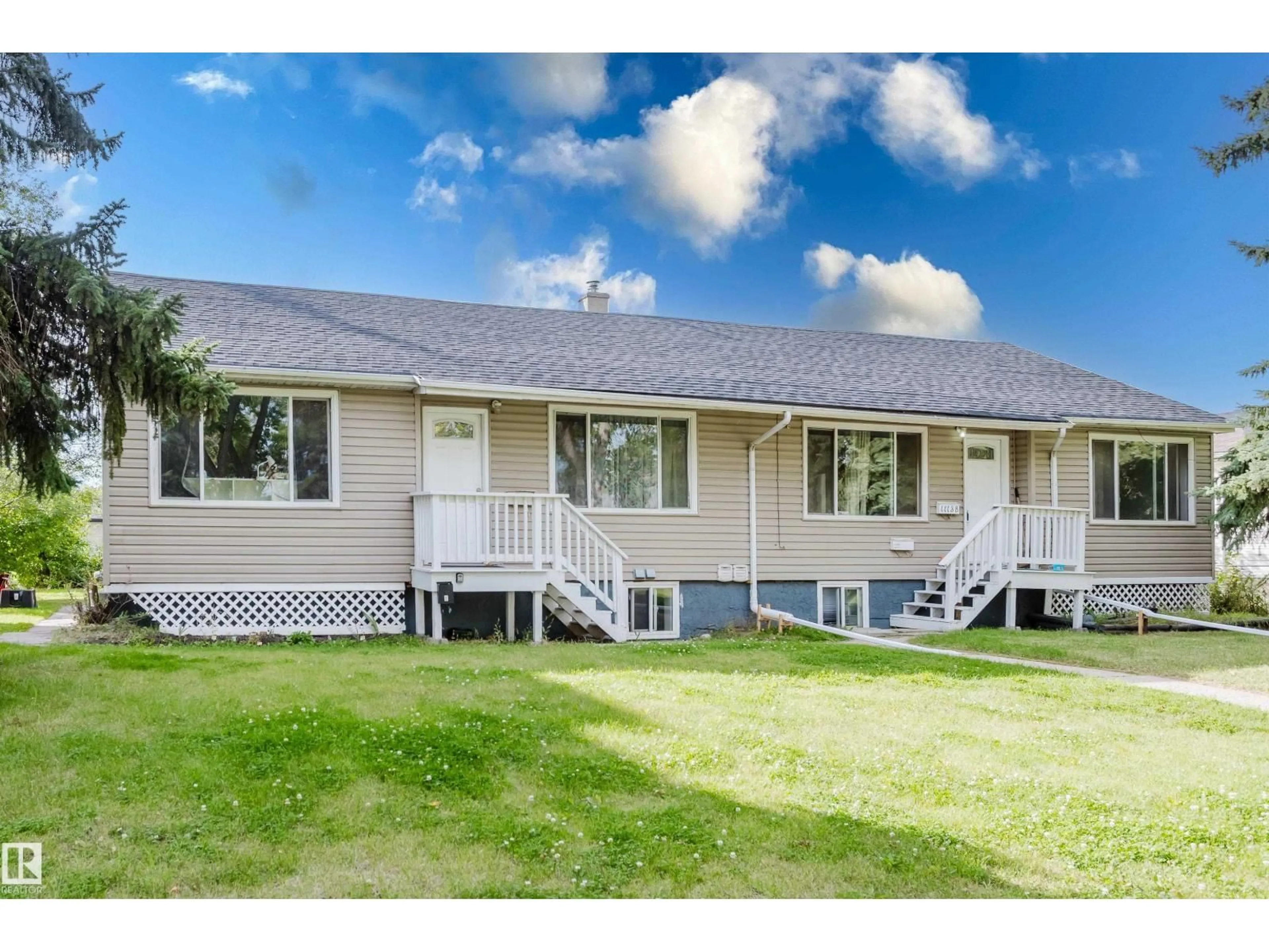 Home with vinyl exterior material, street for 11134 116 ST, Edmonton Alberta T5G2V8