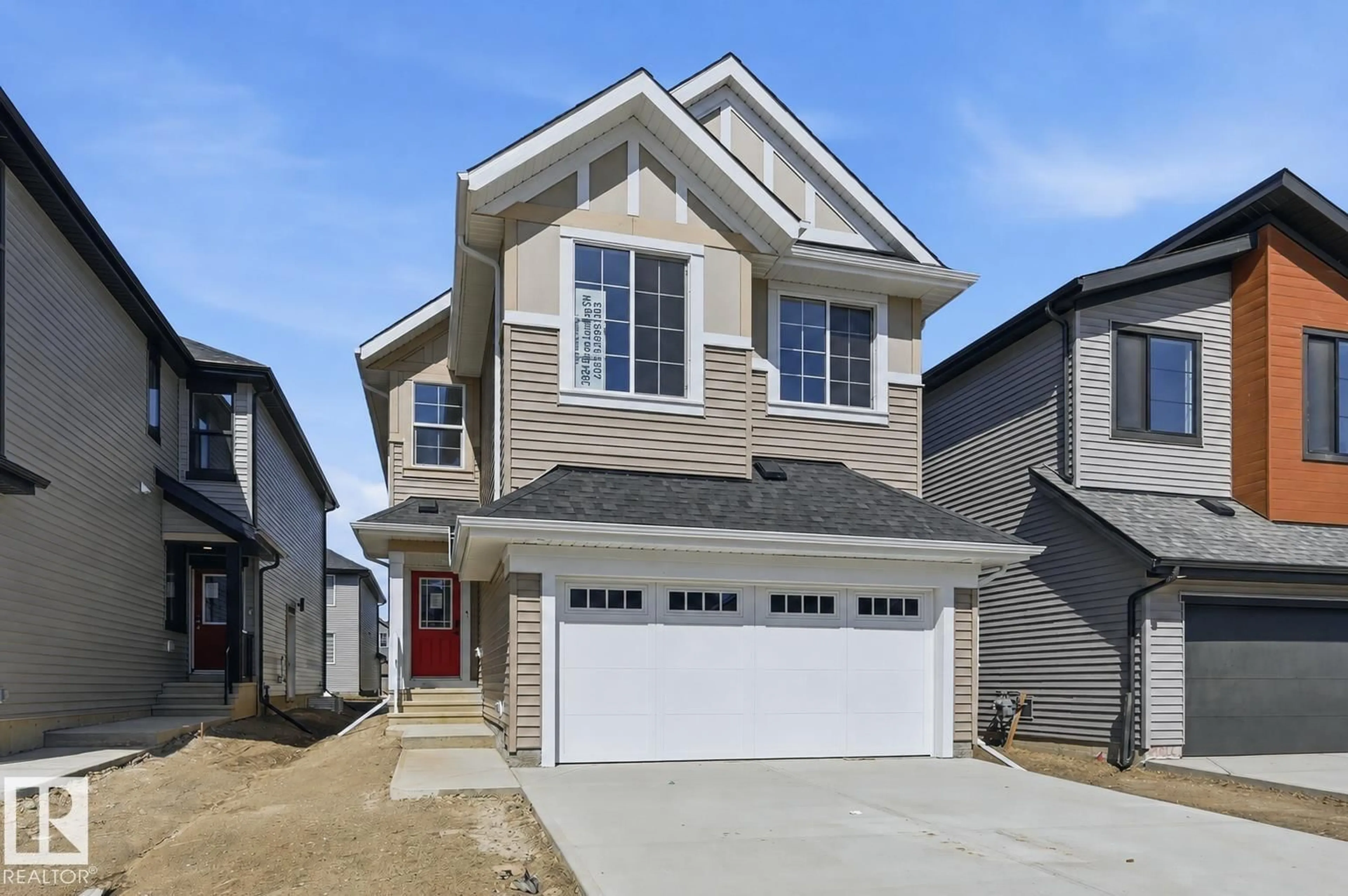 Home with vinyl exterior material, street for 3024 DIXON LD, Edmonton Alberta T6W5L1