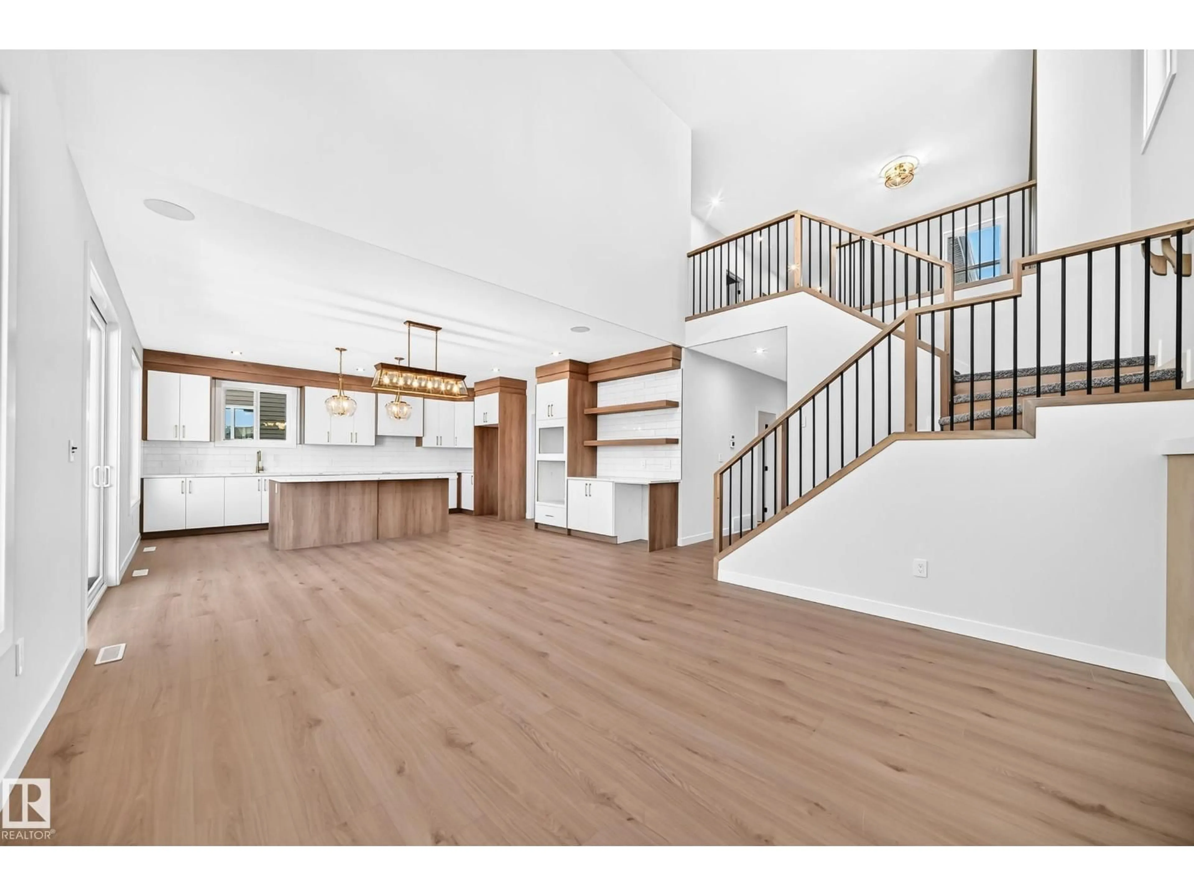 Open concept kitchen, wood/laminate floor for 19 TUPLET BA, Spruce Grove Alberta T7X4S9