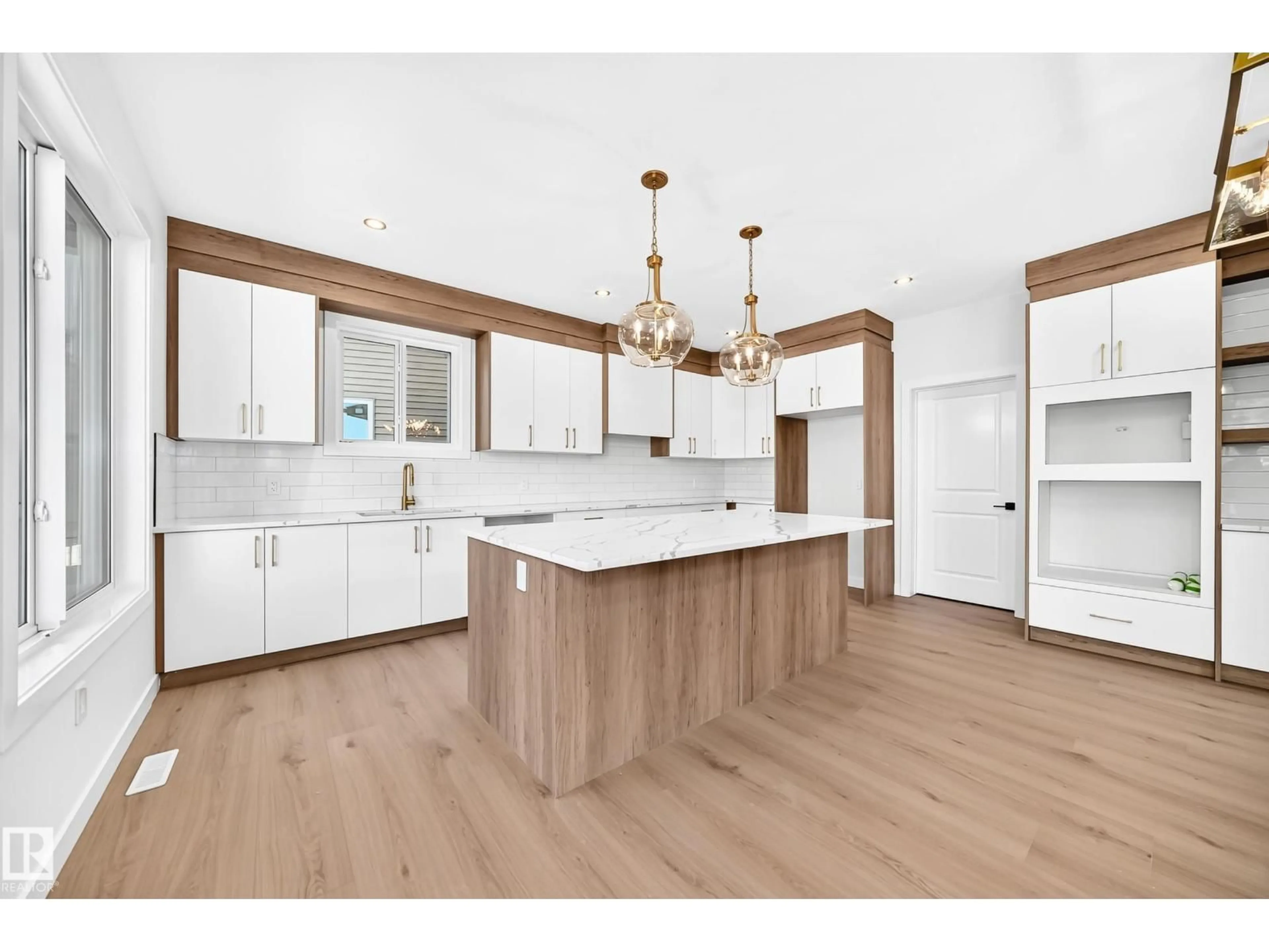 Open concept kitchen, wood/laminate floor for 19 TUPLET BA, Spruce Grove Alberta T7X4S9