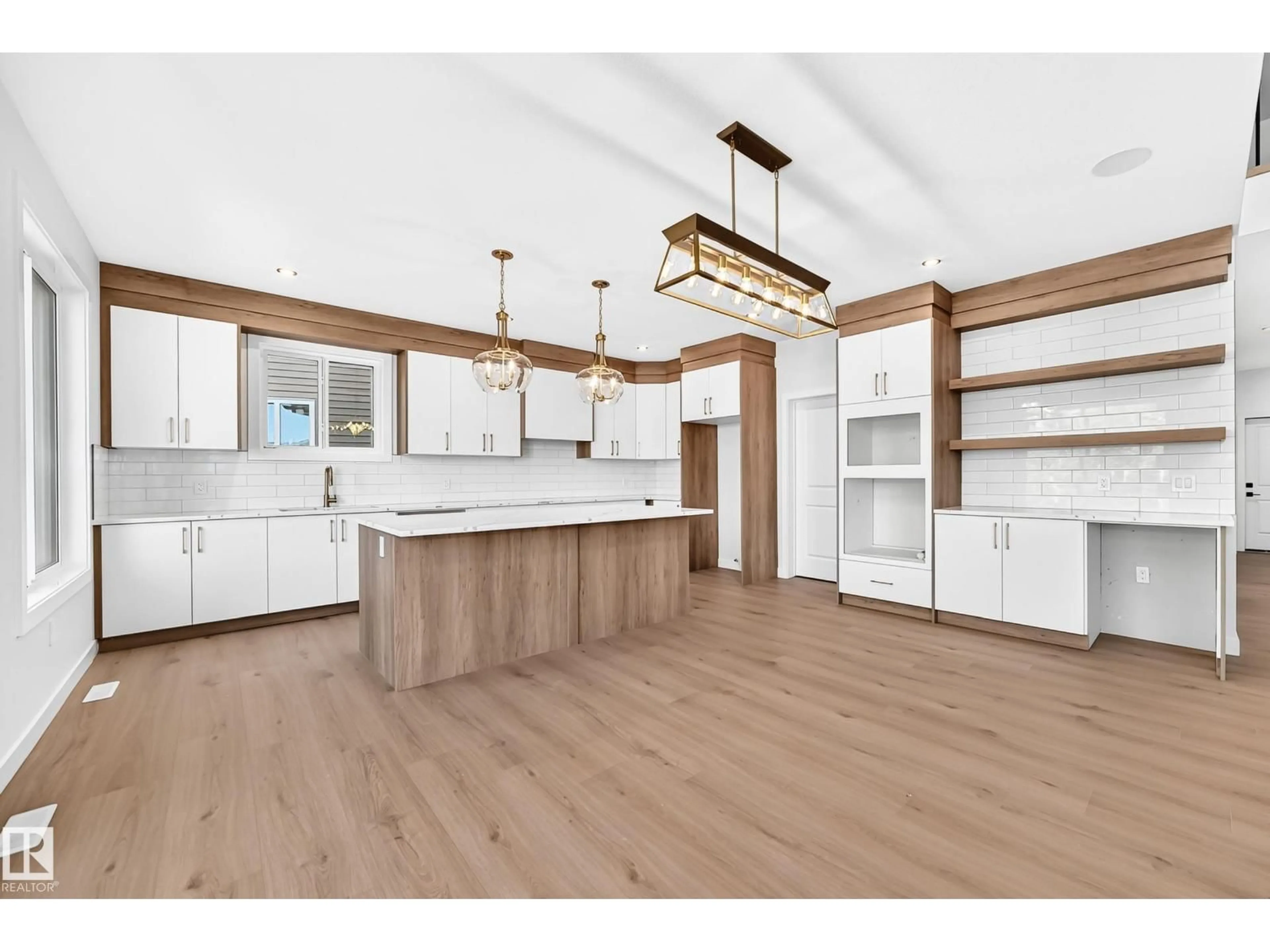 Open concept kitchen, wood/laminate floor for 19 TUPLET BA, Spruce Grove Alberta T7X4S9
