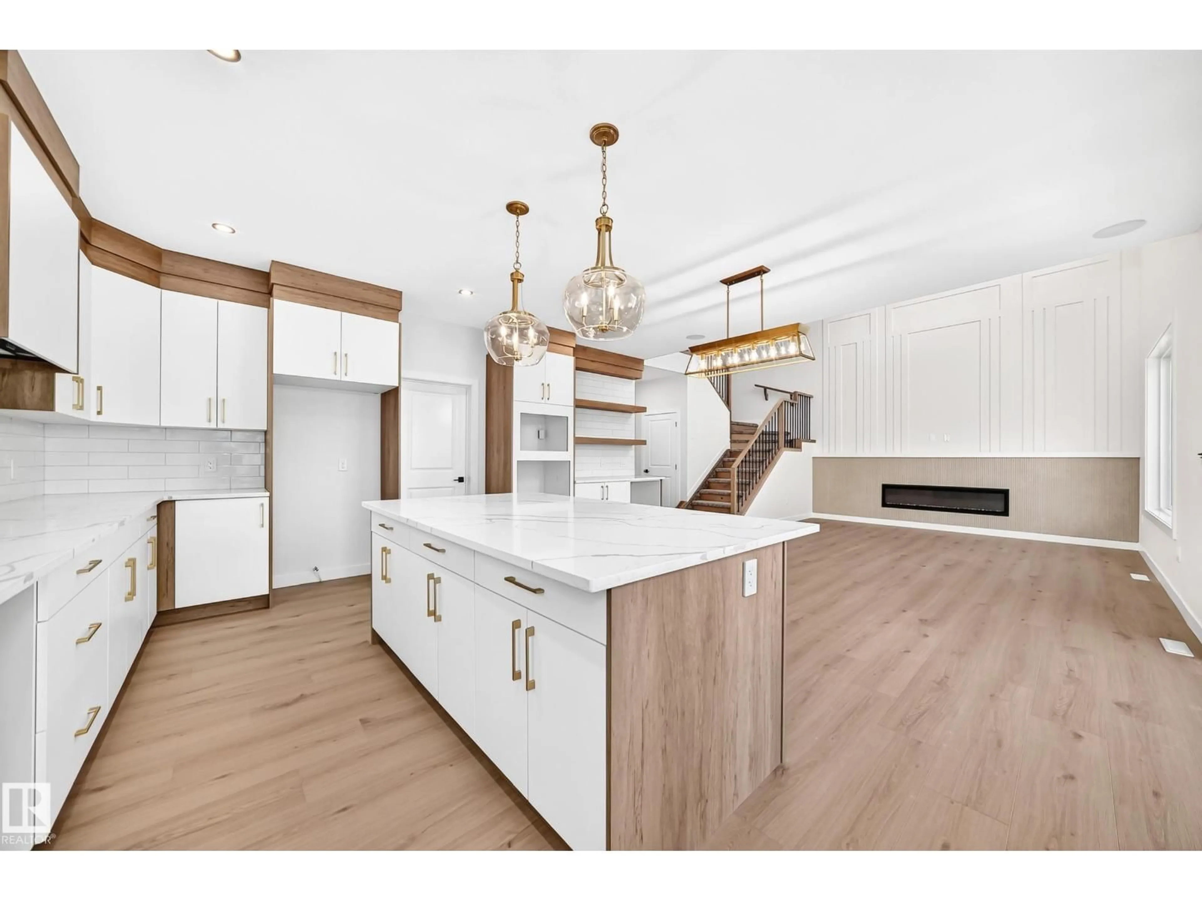 Open concept kitchen, wood/laminate floor for 19 TUPLET BA, Spruce Grove Alberta T7X4S9
