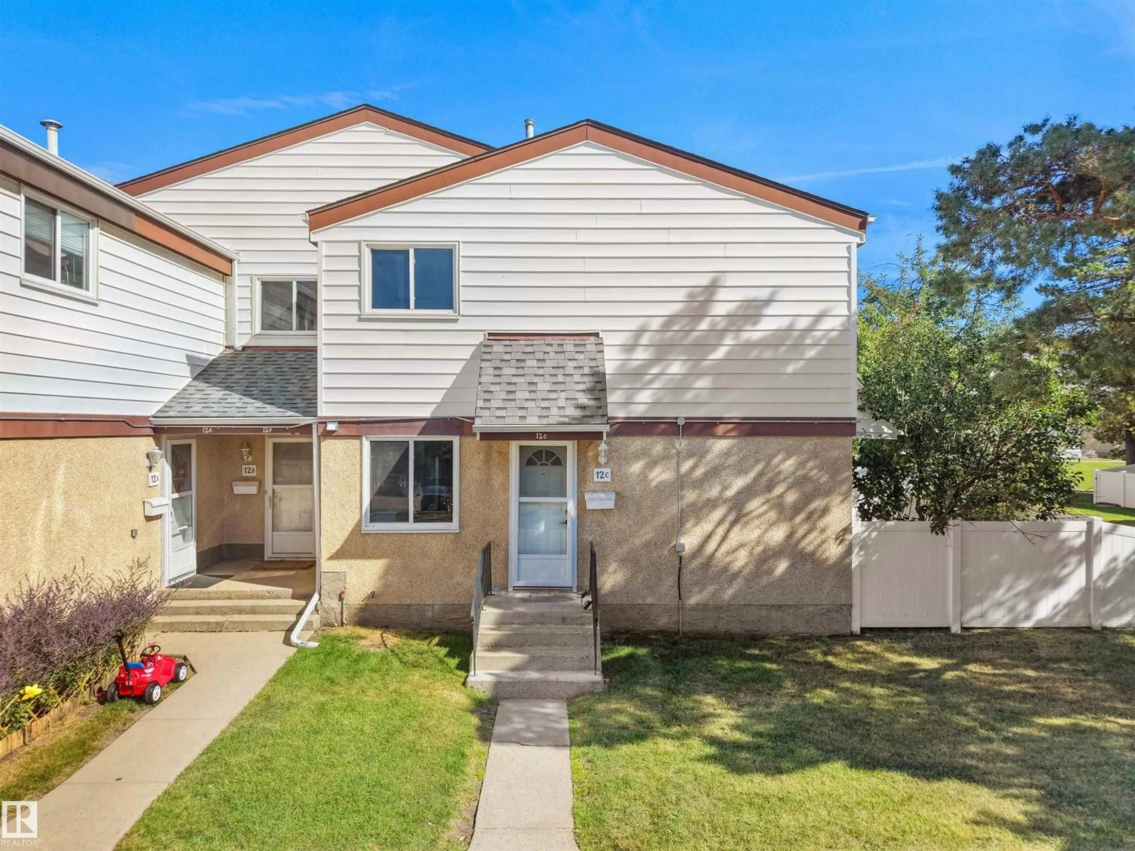 Home with vinyl exterior material, street for NW - 12C TWIN TC, Edmonton Alberta T6K1V4