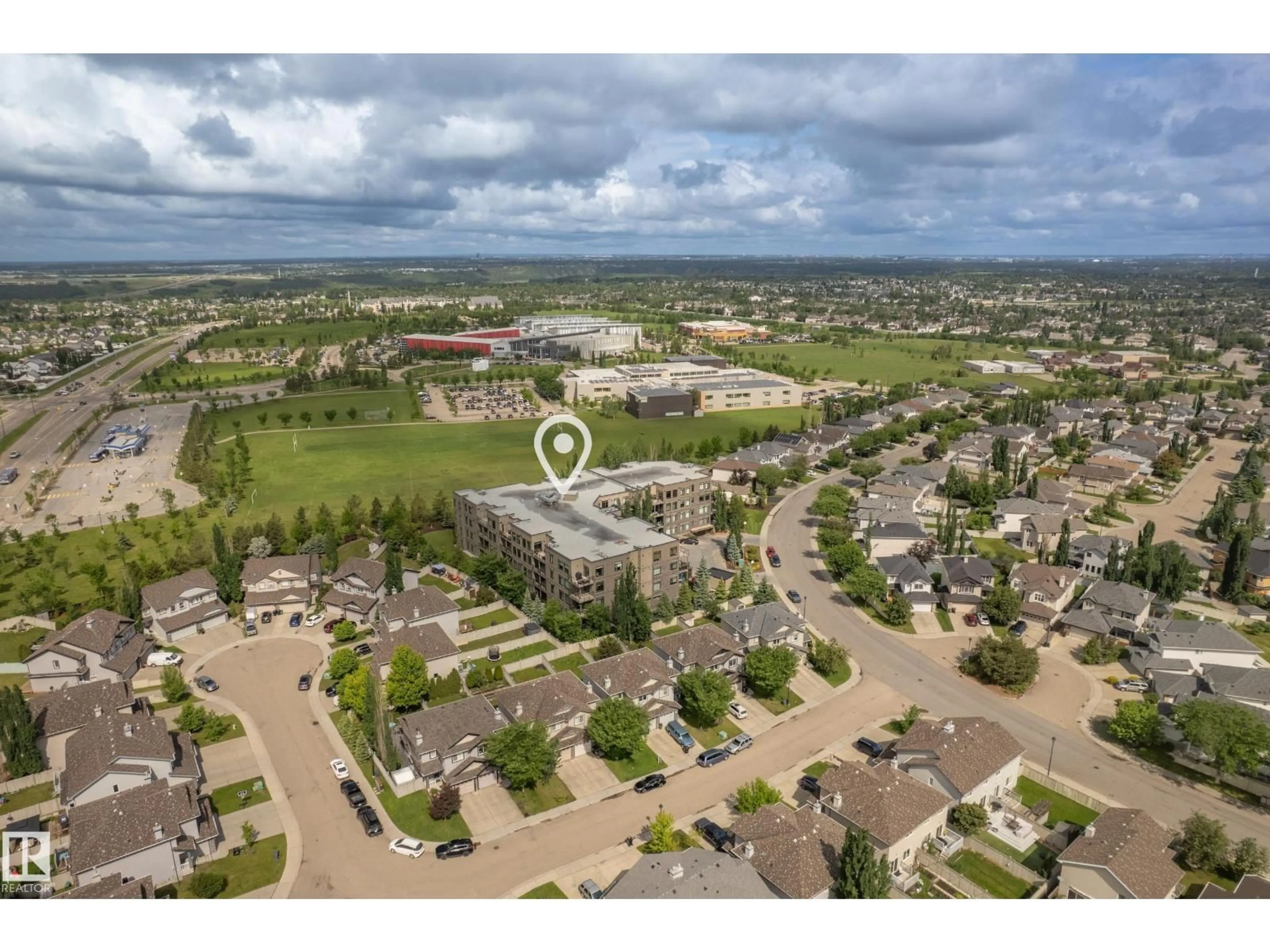 A pic from outside/outdoor area/front of a property/back of a property/a pic from drone, street for 625 - 310 LEGER WY, Edmonton Alberta T6R0W4