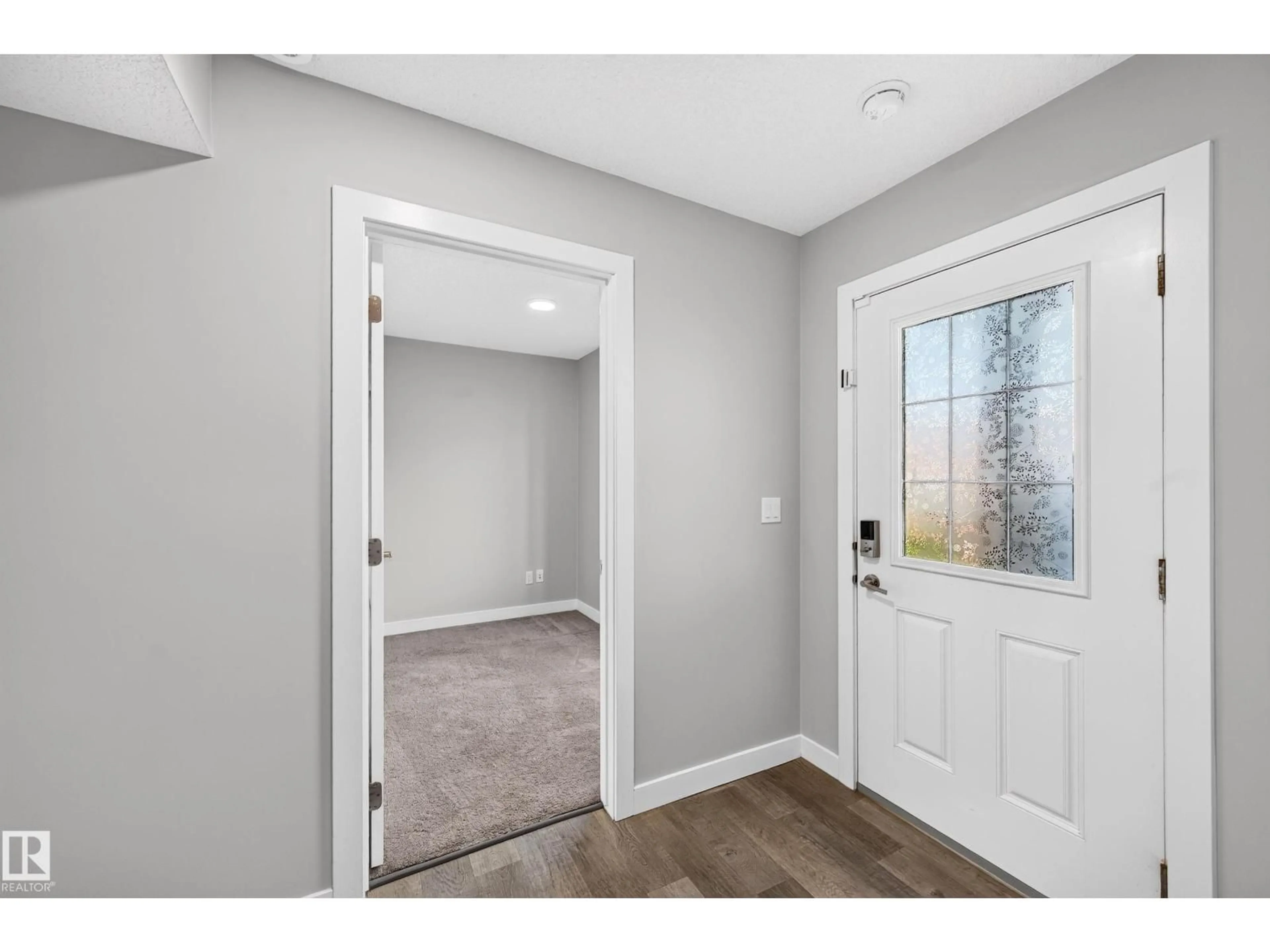 Indoor entryway for #44 - 3025 151 AV, Edmonton Alberta T5Y3W4