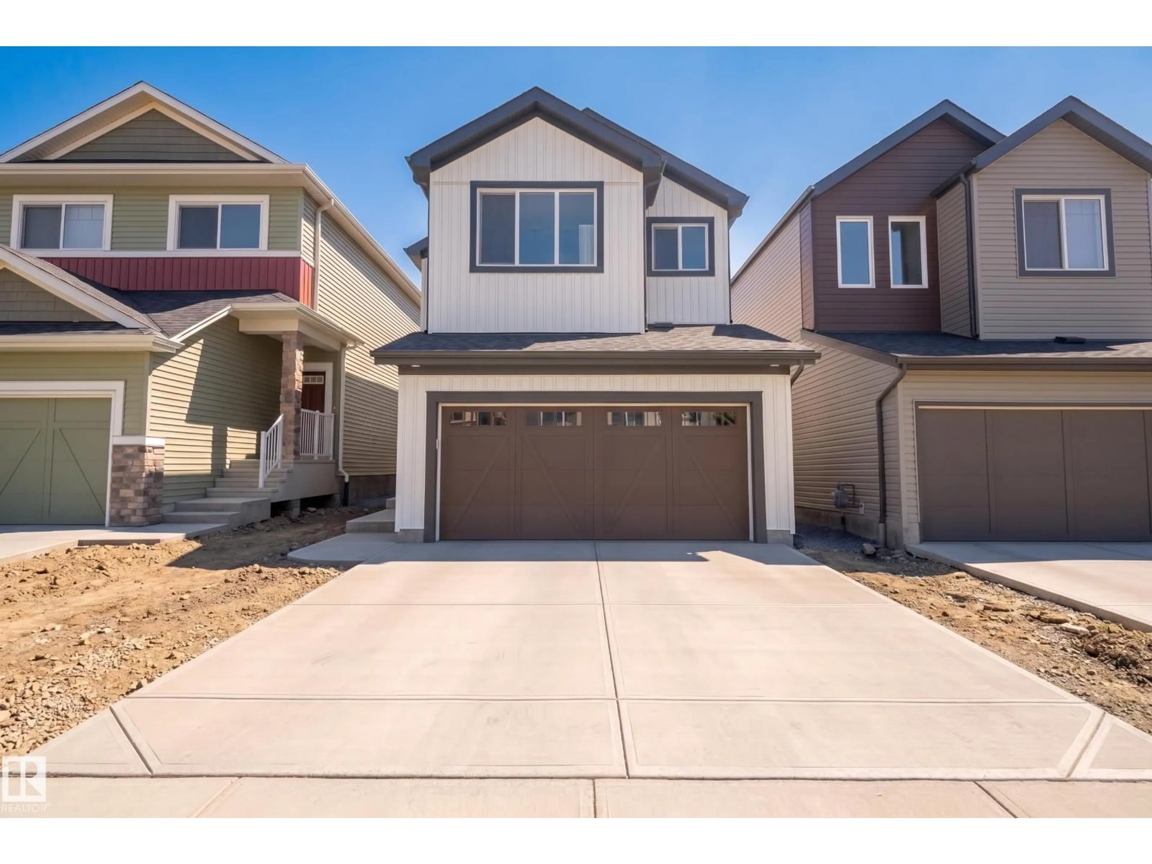 Home with vinyl exterior material, street for 20739 24 AV, Edmonton Alberta T6M2J7
