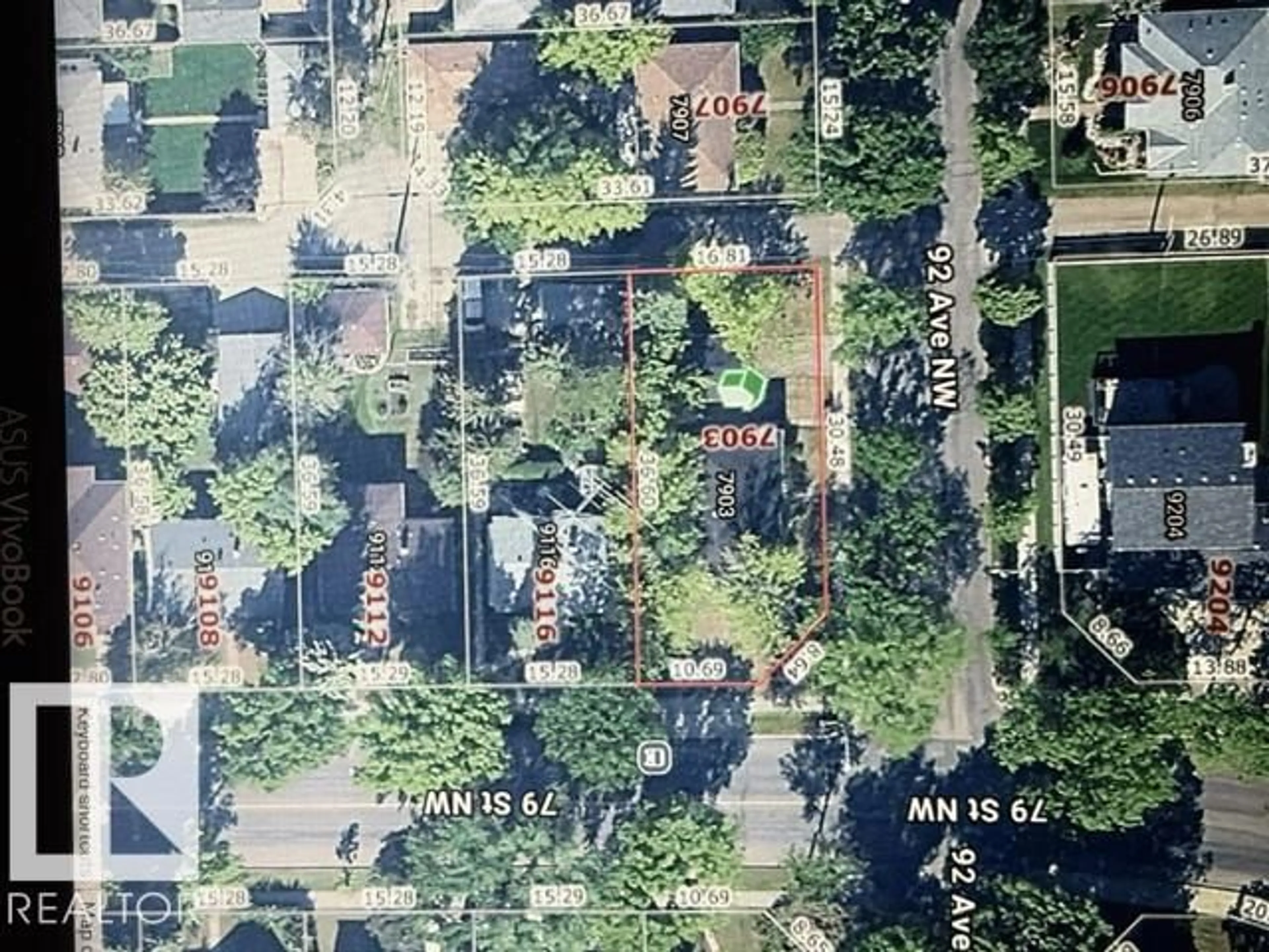 A pic from outside/outdoor area/front of a property/back of a property/a pic from drone, street for 7903 92 AV, Edmonton Alberta T6C1R6