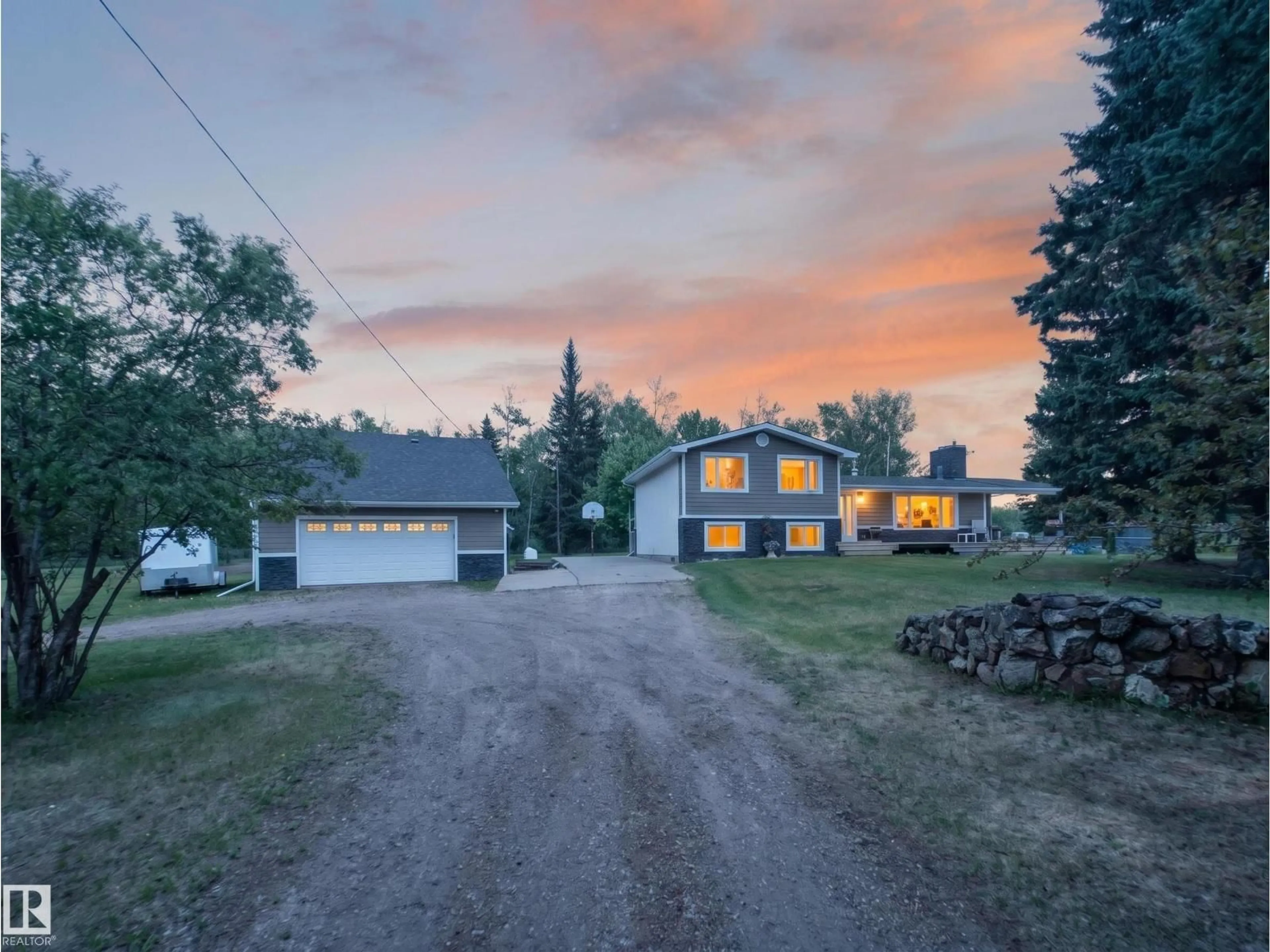 A pic from outside/outdoor area/front of a property/back of a property/a pic from drone, street for 22048 TWP ROAD 522, Rural Strathcona County Alberta T8E1G2
