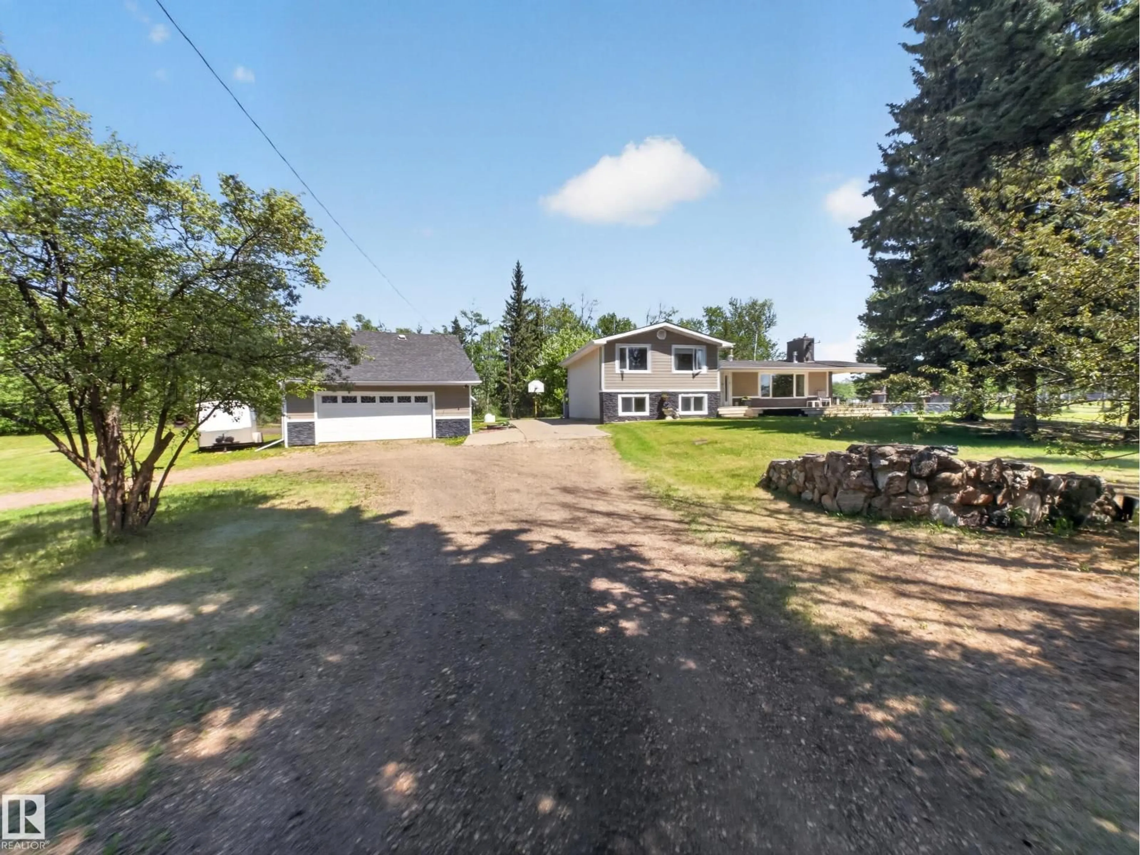 A pic from outside/outdoor area/front of a property/back of a property/a pic from drone, street for 22048 TWP ROAD 522, Rural Strathcona County Alberta T8E1G2
