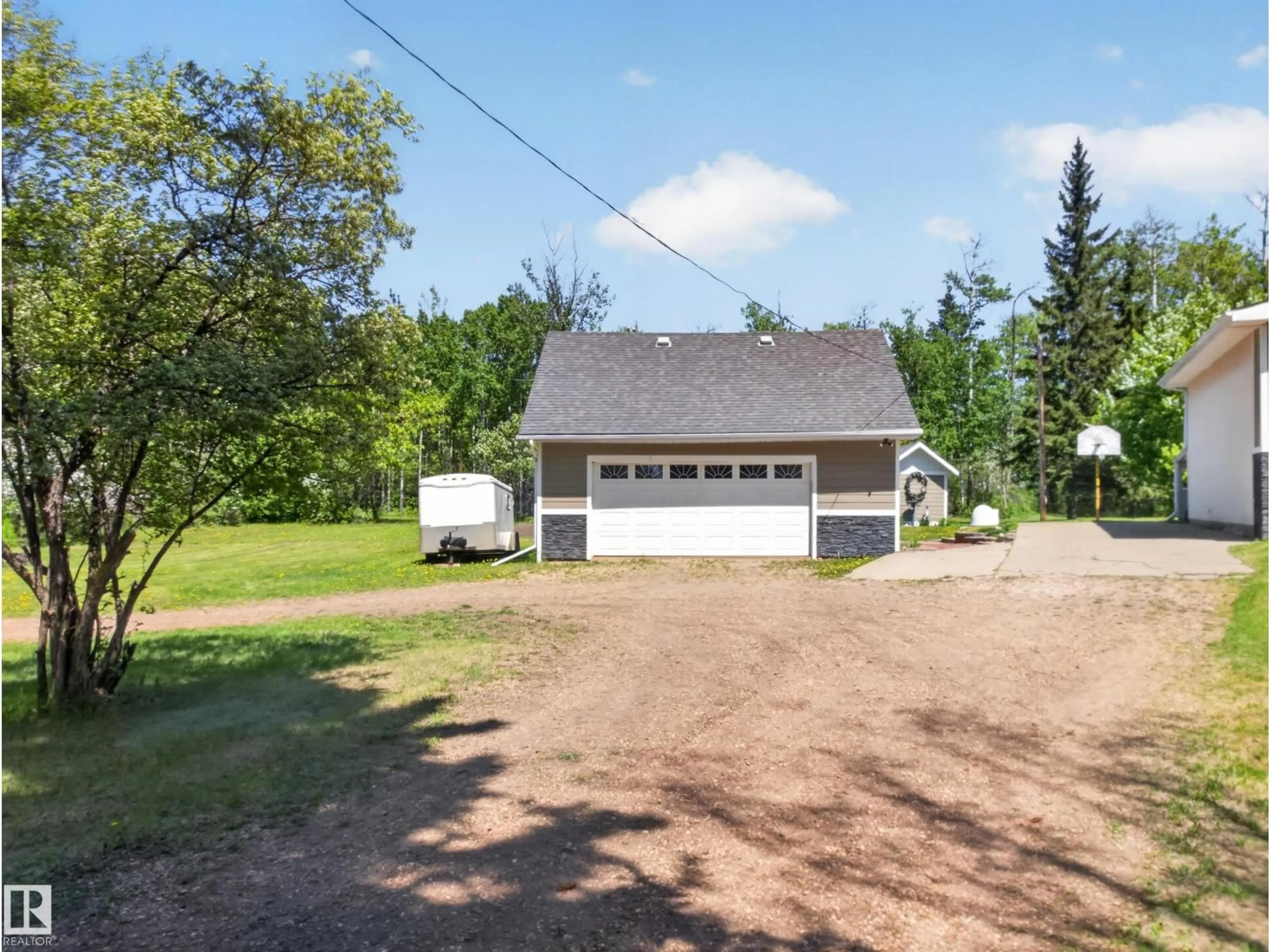 A pic from outside/outdoor area/front of a property/back of a property/a pic from drone, street for 22048 TWP ROAD 522, Rural Strathcona County Alberta T8E1G2