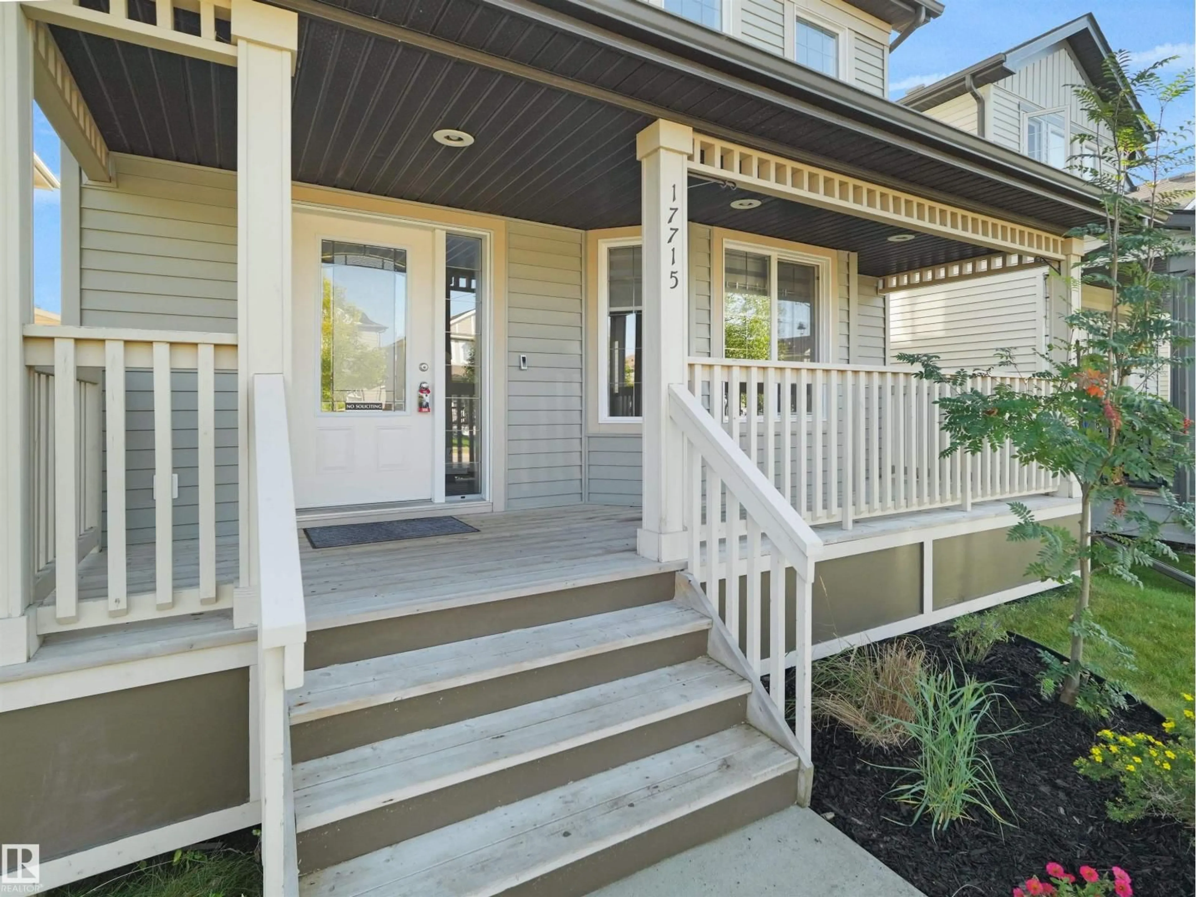 Home with vinyl exterior material, street for 17715 6 AV, Edmonton Alberta T6W2G6
