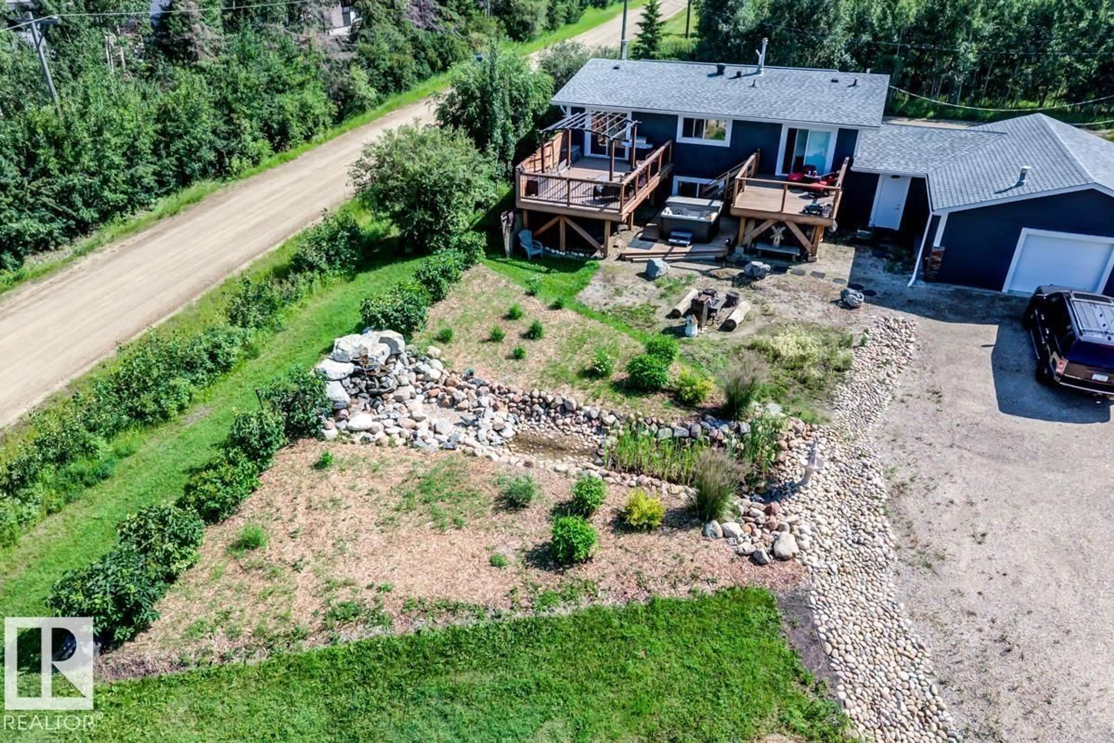 A pic from outside/outdoor area/front of a property/back of a property/a pic from drone, unknown for #2 - 53220 RGE ROAD 263, Rural Parkland County Alberta T7X4M1