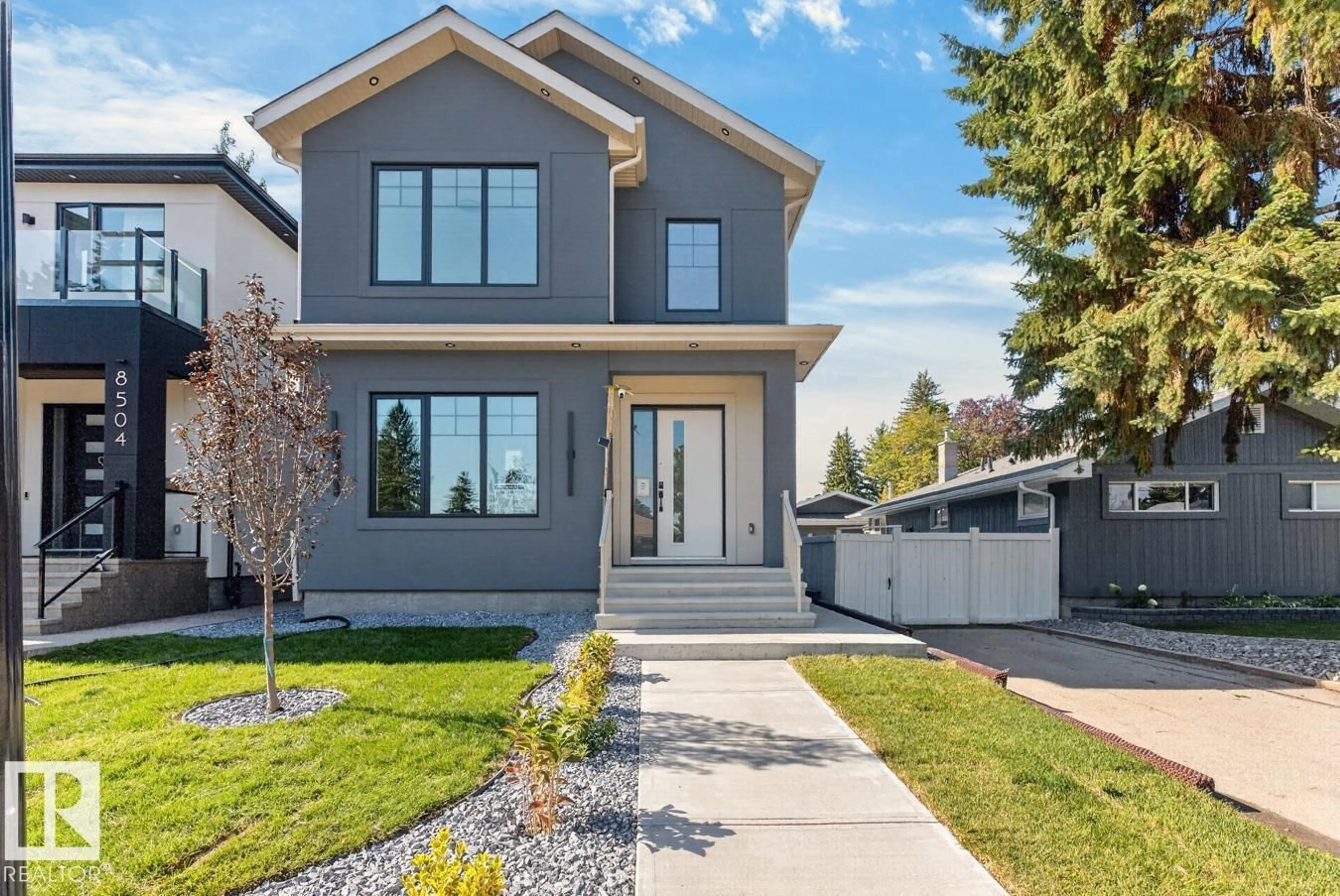 Home with vinyl exterior material, street for 8506 148 ST NW, Edmonton Alberta T5R0Z6