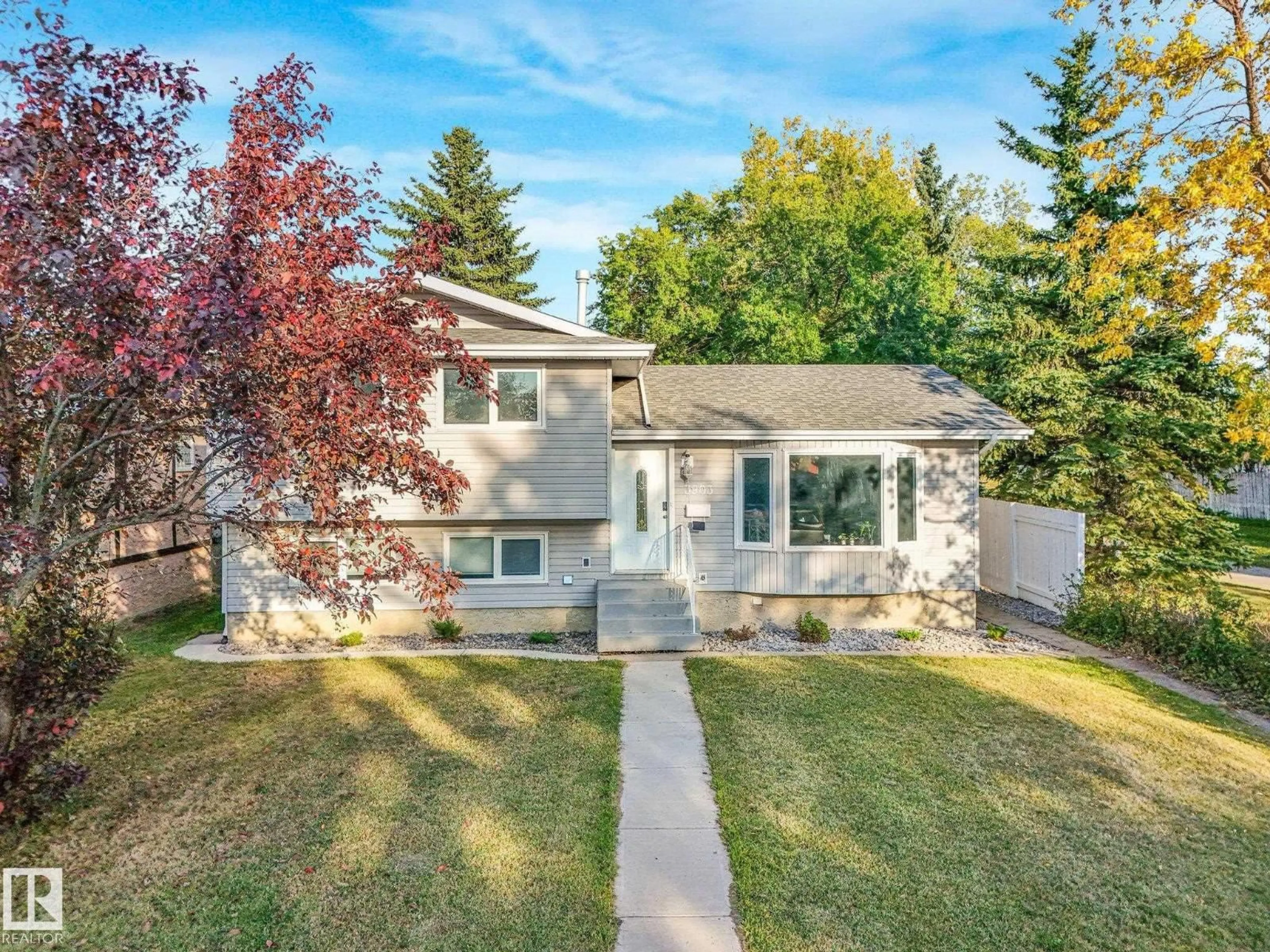 Home with vinyl exterior material, street for 3903 62 ST, Edmonton Alberta T6L1A4