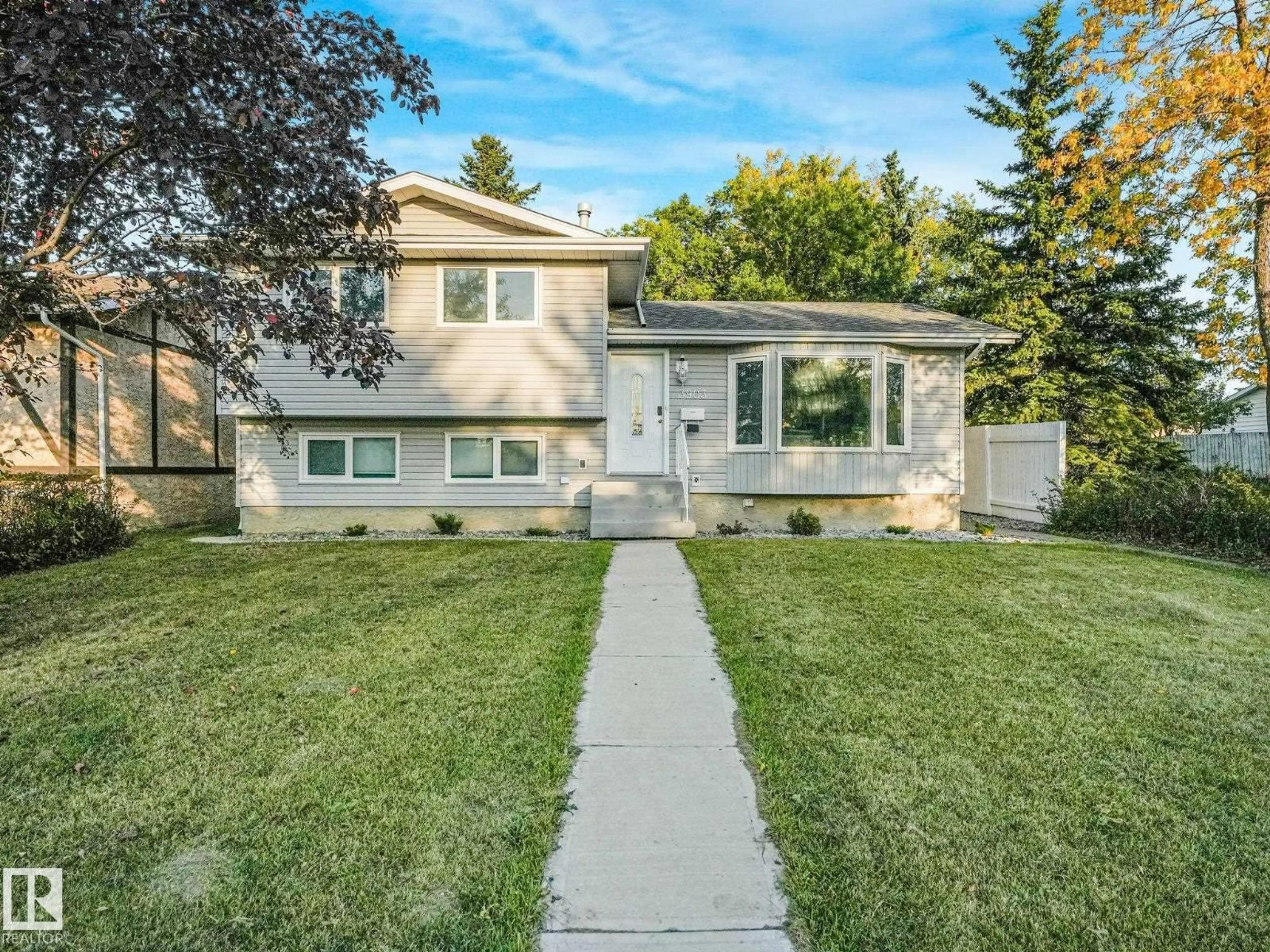 Home with vinyl exterior material, street for 3903 62 ST, Edmonton Alberta T6L1A4