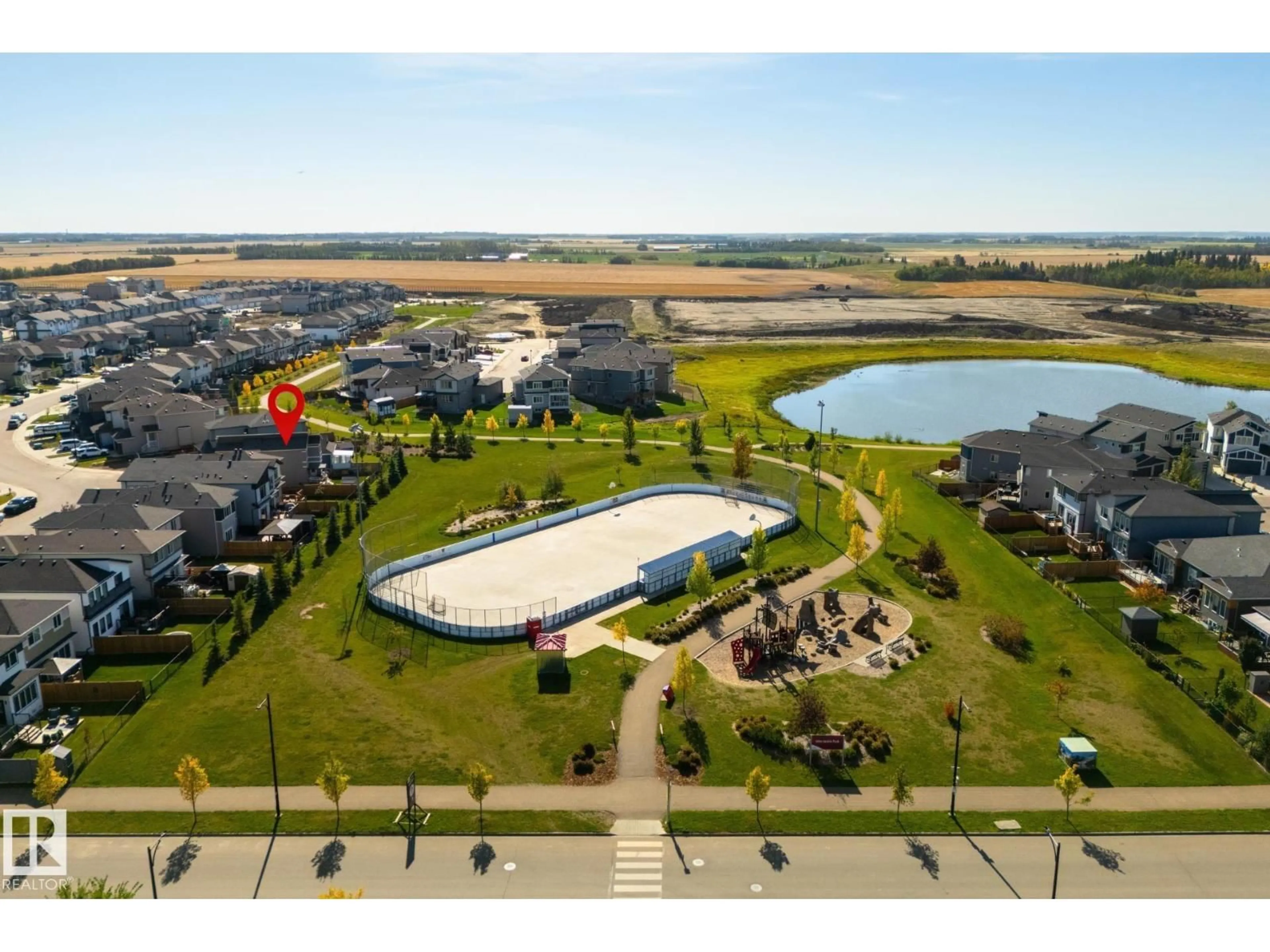 A pic from outside/outdoor area/front of a property/back of a property/a pic from drone, water/lake/river/ocean view for 1032 BERG PL, Leduc Alberta T9E1M4