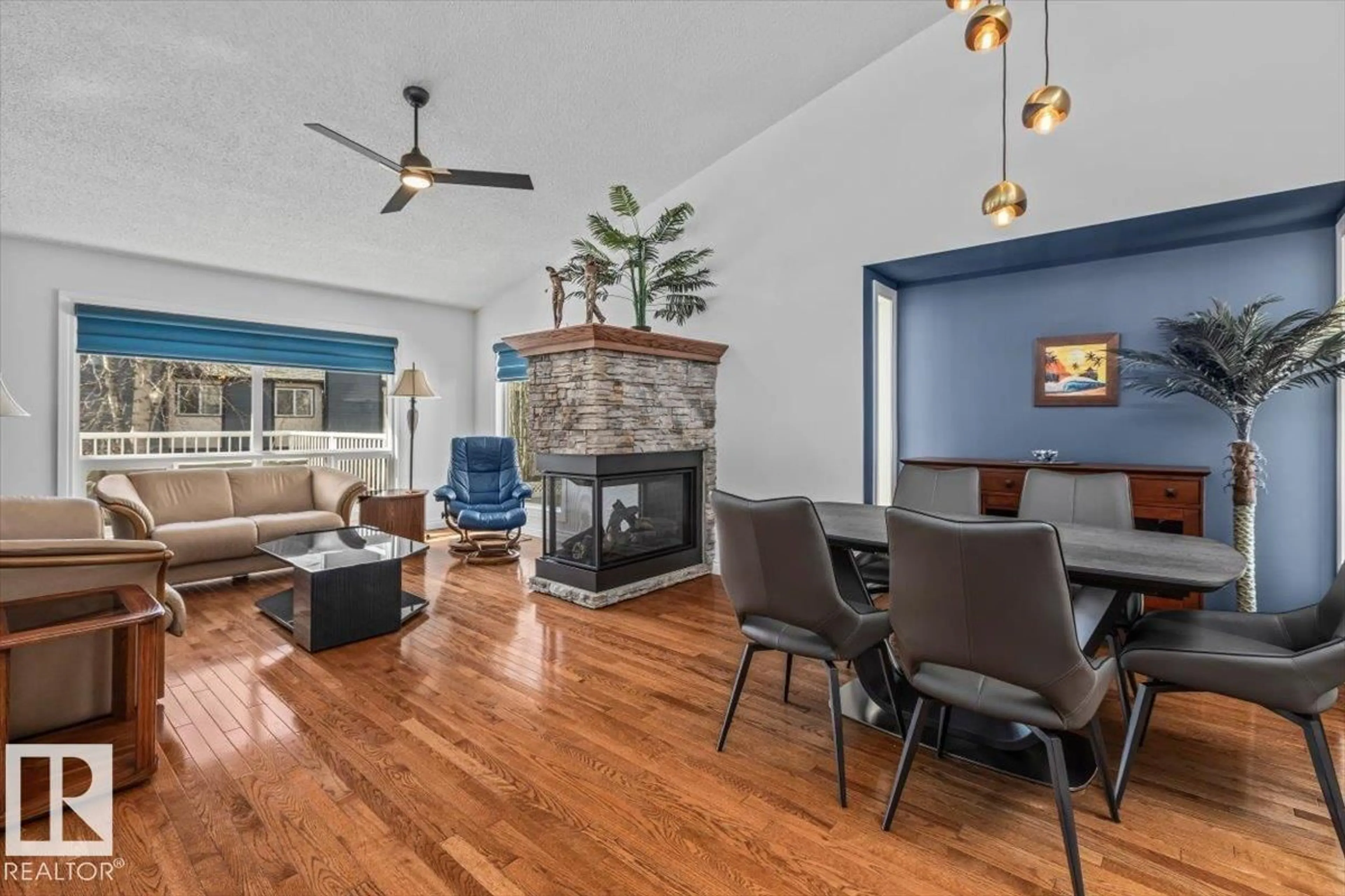 Living room with furniture, wood/laminate floor for 85 - 10 GERVAIS RD, St. Albert Alberta T8N6H4