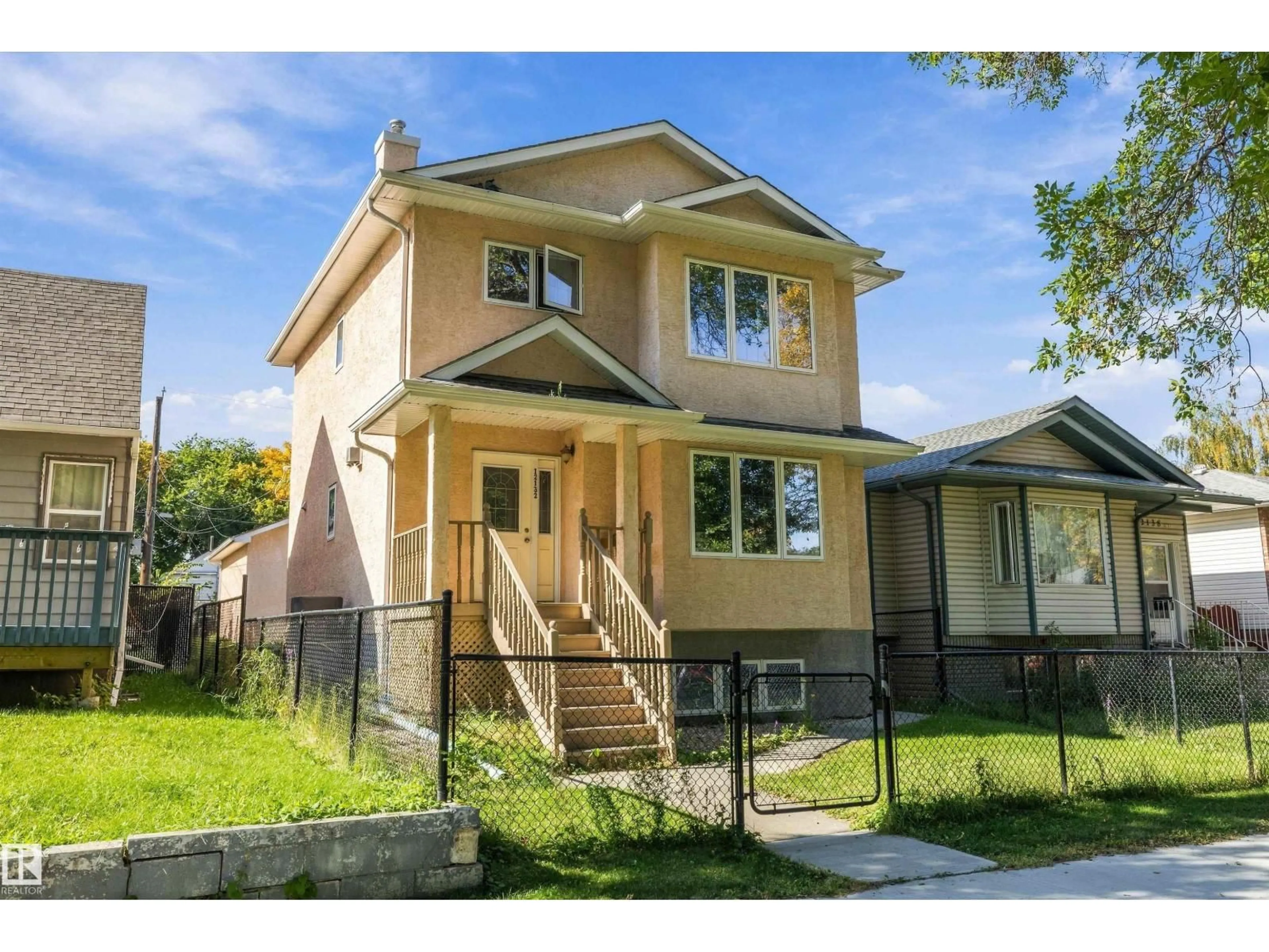 Home with vinyl exterior material, street for 12132 92 ST, Edmonton Alberta T5G1B2