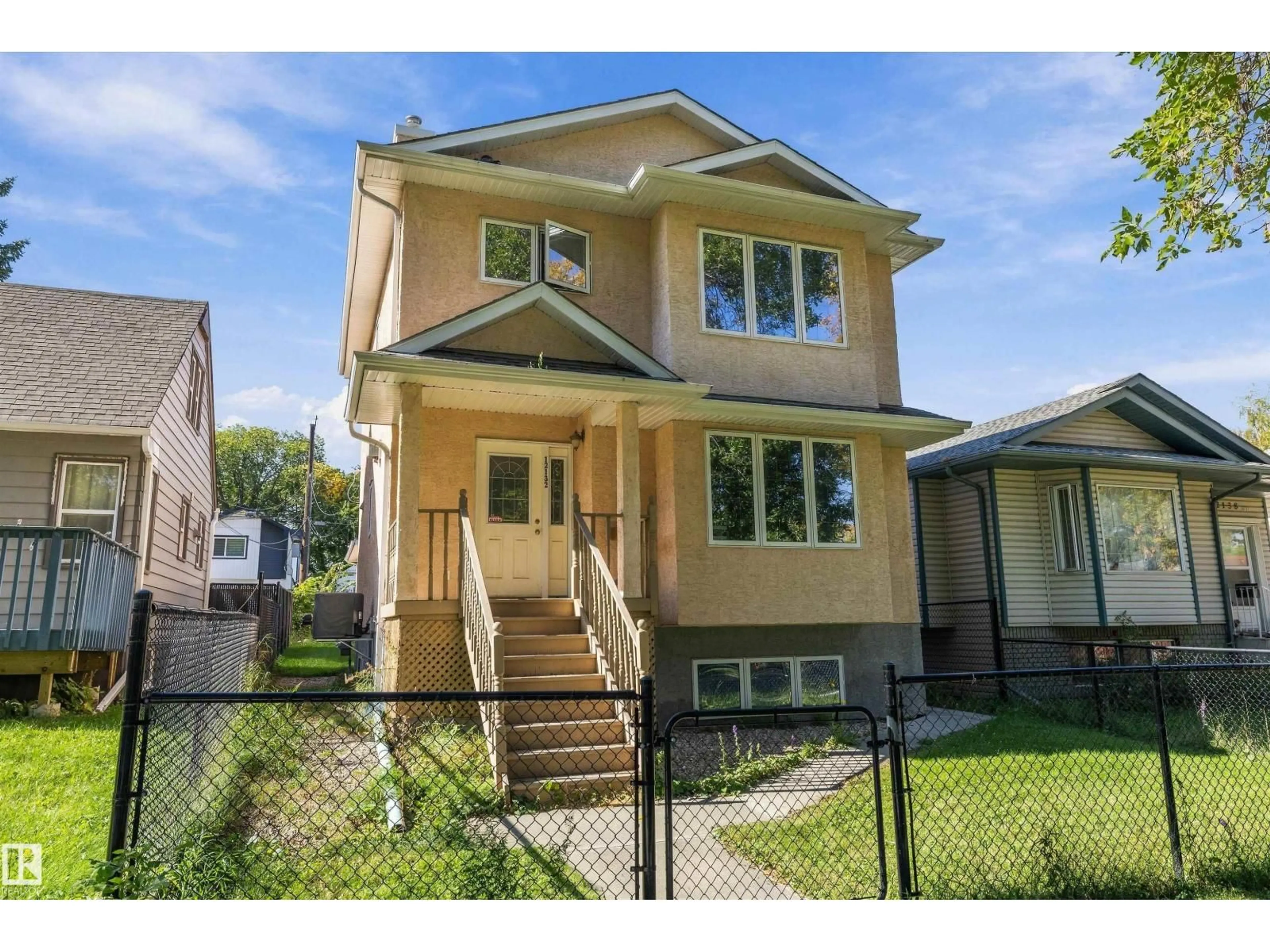 Home with vinyl exterior material, street for 12132 92 ST, Edmonton Alberta T5G1B2
