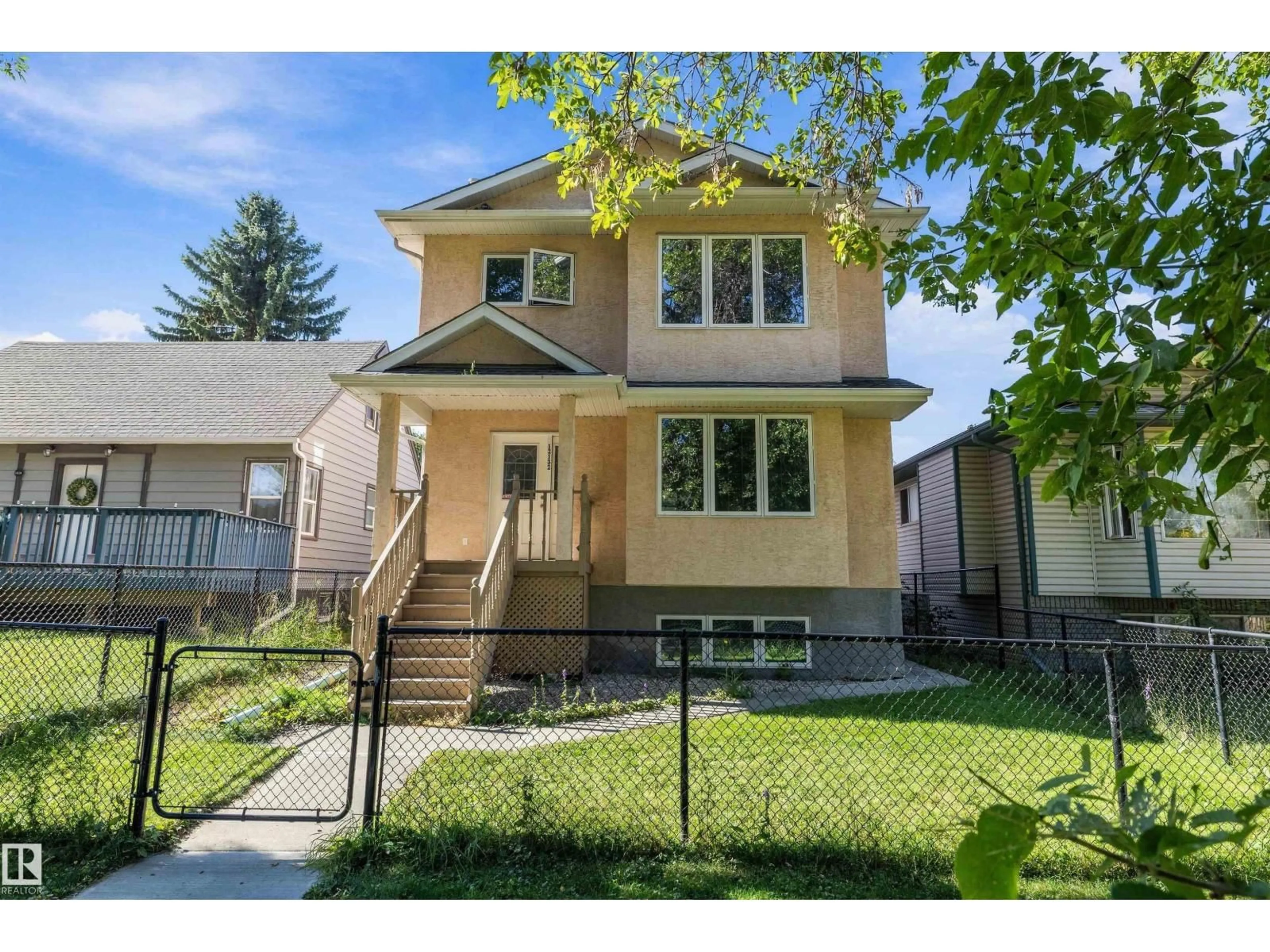 Home with vinyl exterior material, street for 12132 92 ST, Edmonton Alberta T5G1B2