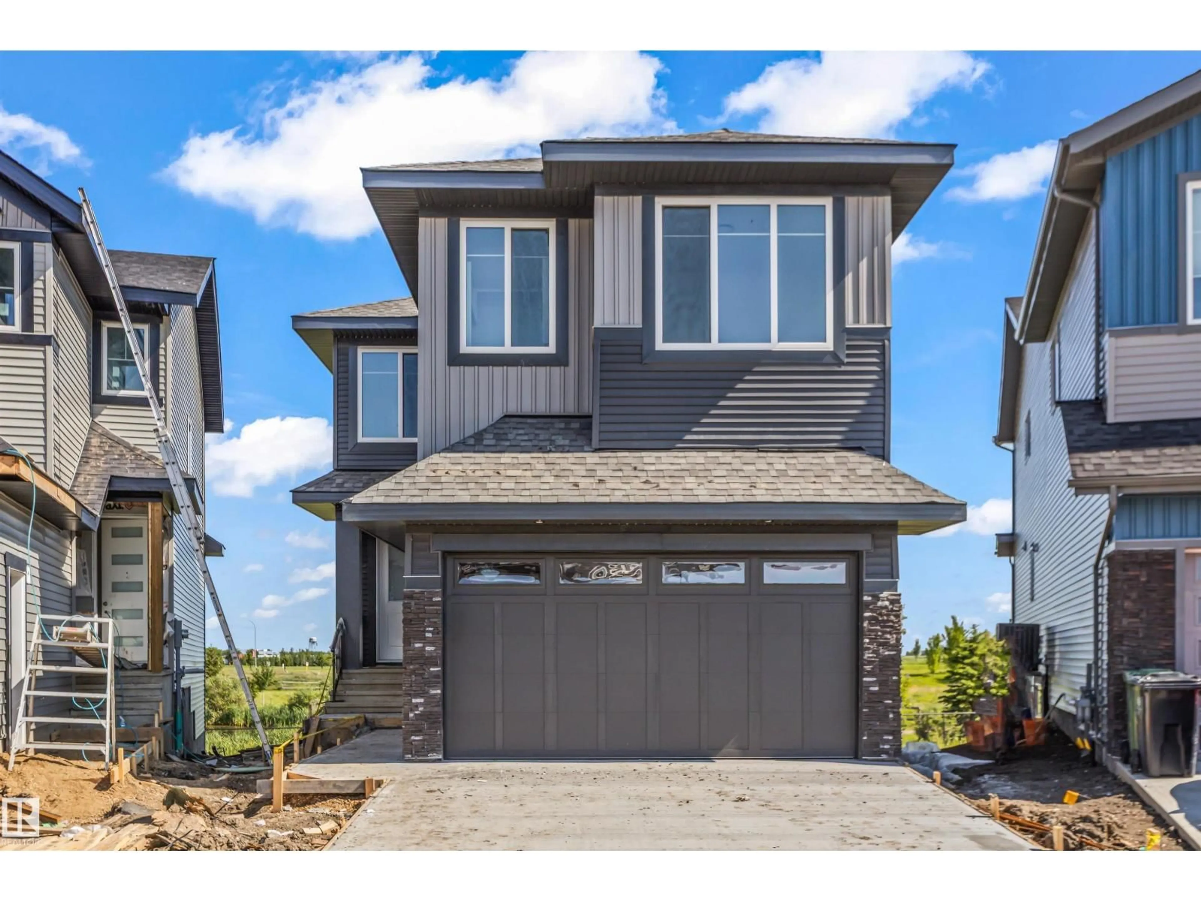 Home with vinyl exterior material, street for 178 ELLIOTT WD, Fort Saskatchewan Alberta T8L1V1
