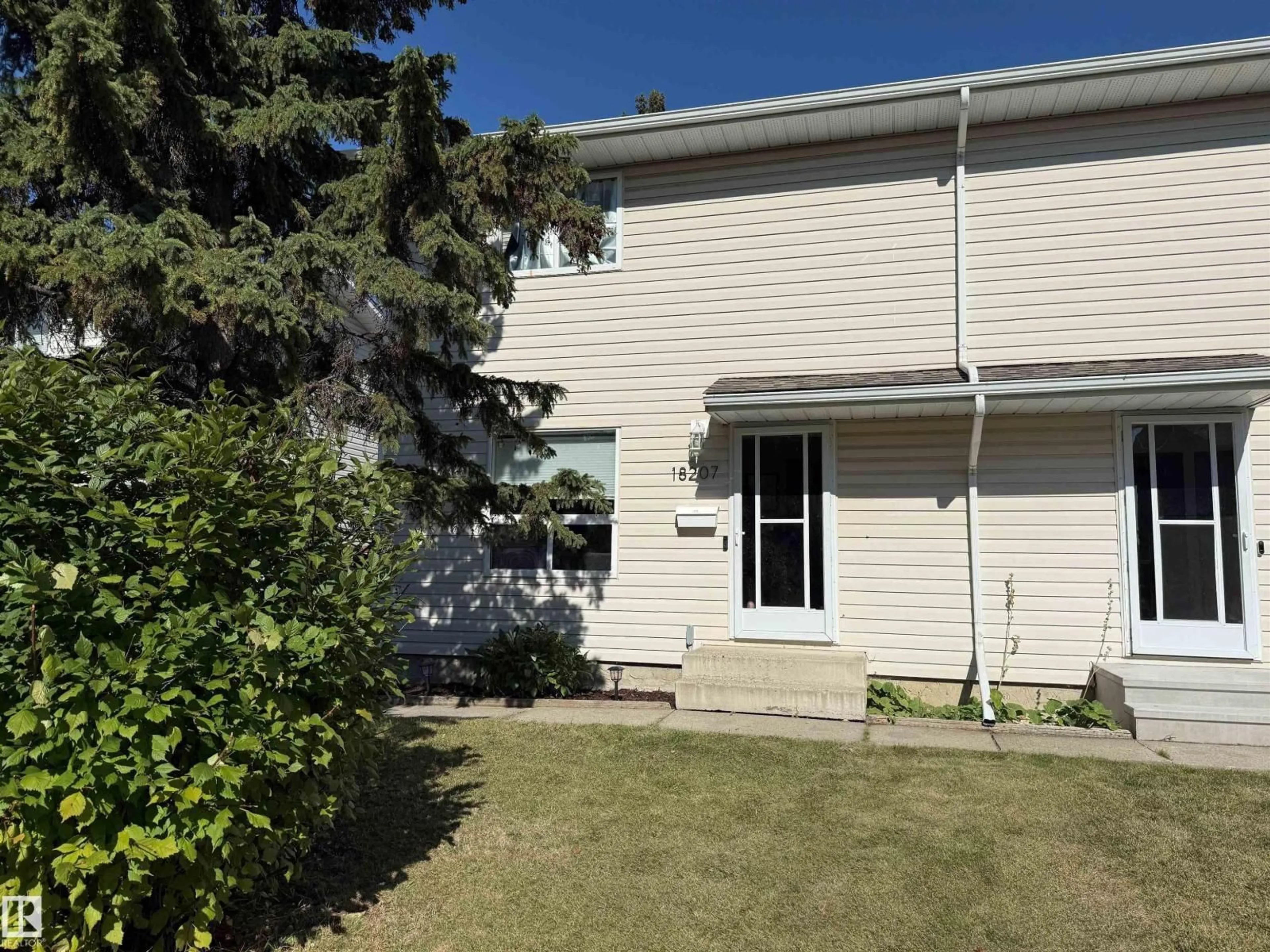 A pic from outside/outdoor area/front of a property/back of a property/a pic from drone, street for 18207 74 AV, Edmonton Alberta T5T2G6
