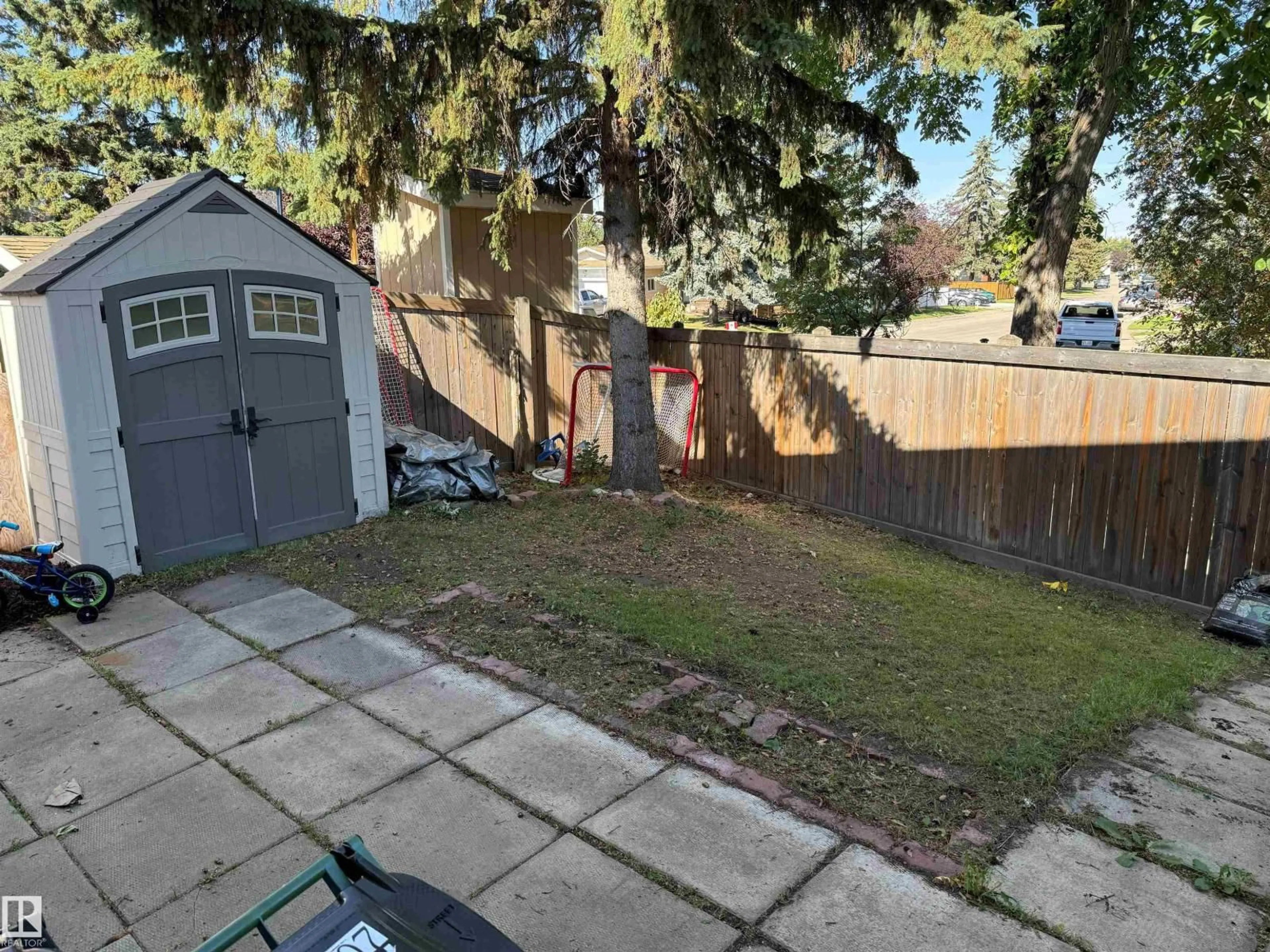 A pic from outside/outdoor area/front of a property/back of a property/a pic from drone, street for 18207 74 AV, Edmonton Alberta T5T2G6