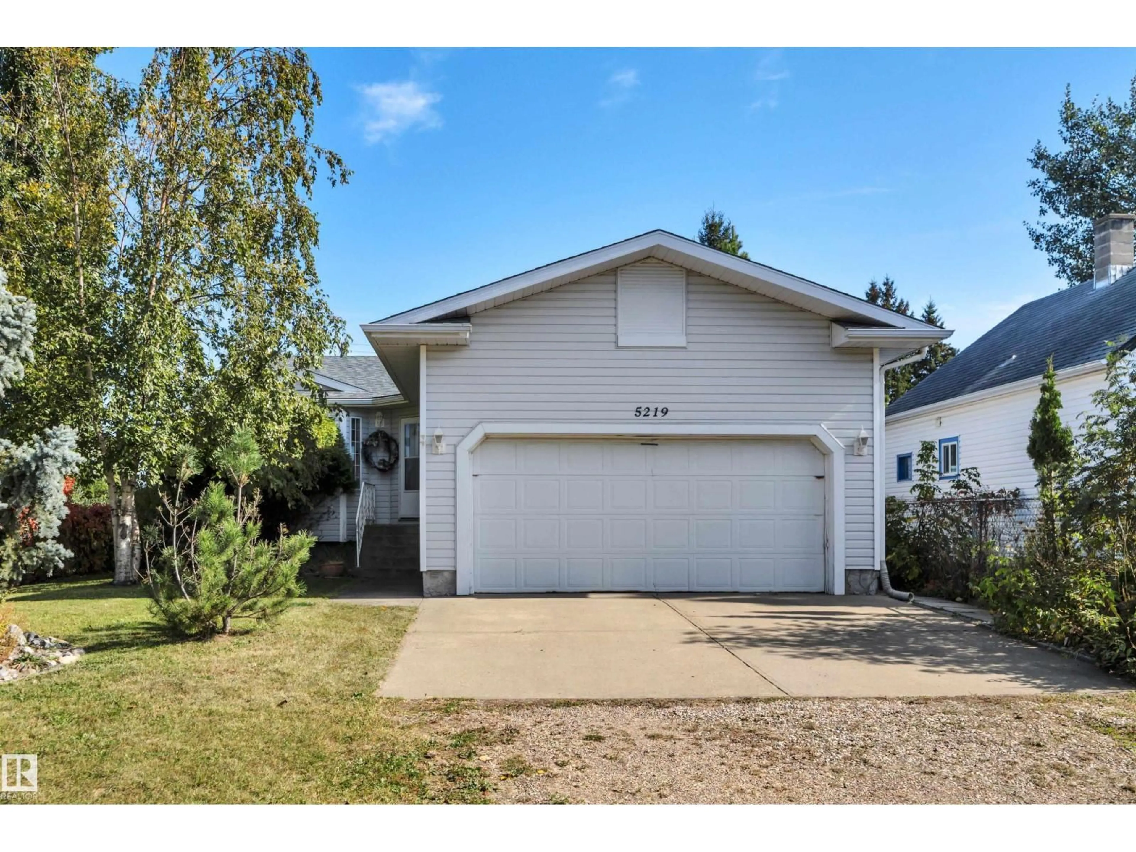 Home with vinyl exterior material, street for 5219 49 ST, Waskatenau Alberta T0A3P0