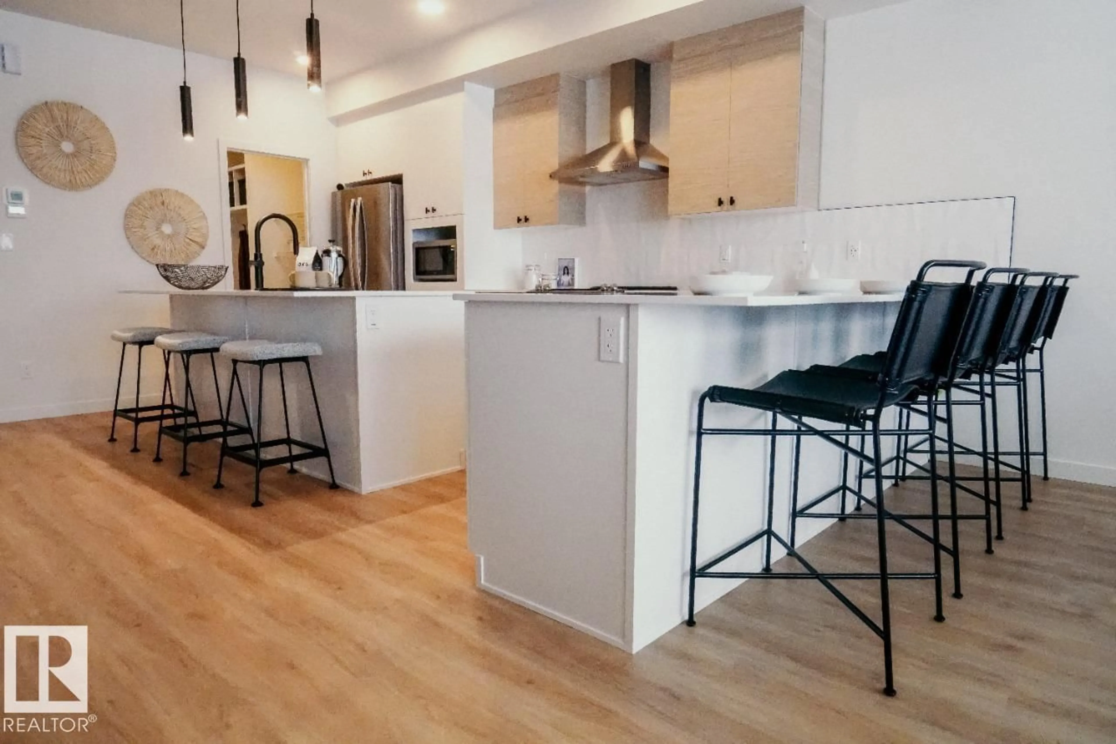 Open concept kitchen, wood/laminate floor for 198 STETSON LOOP, Ardrossan Alberta T8E2E4