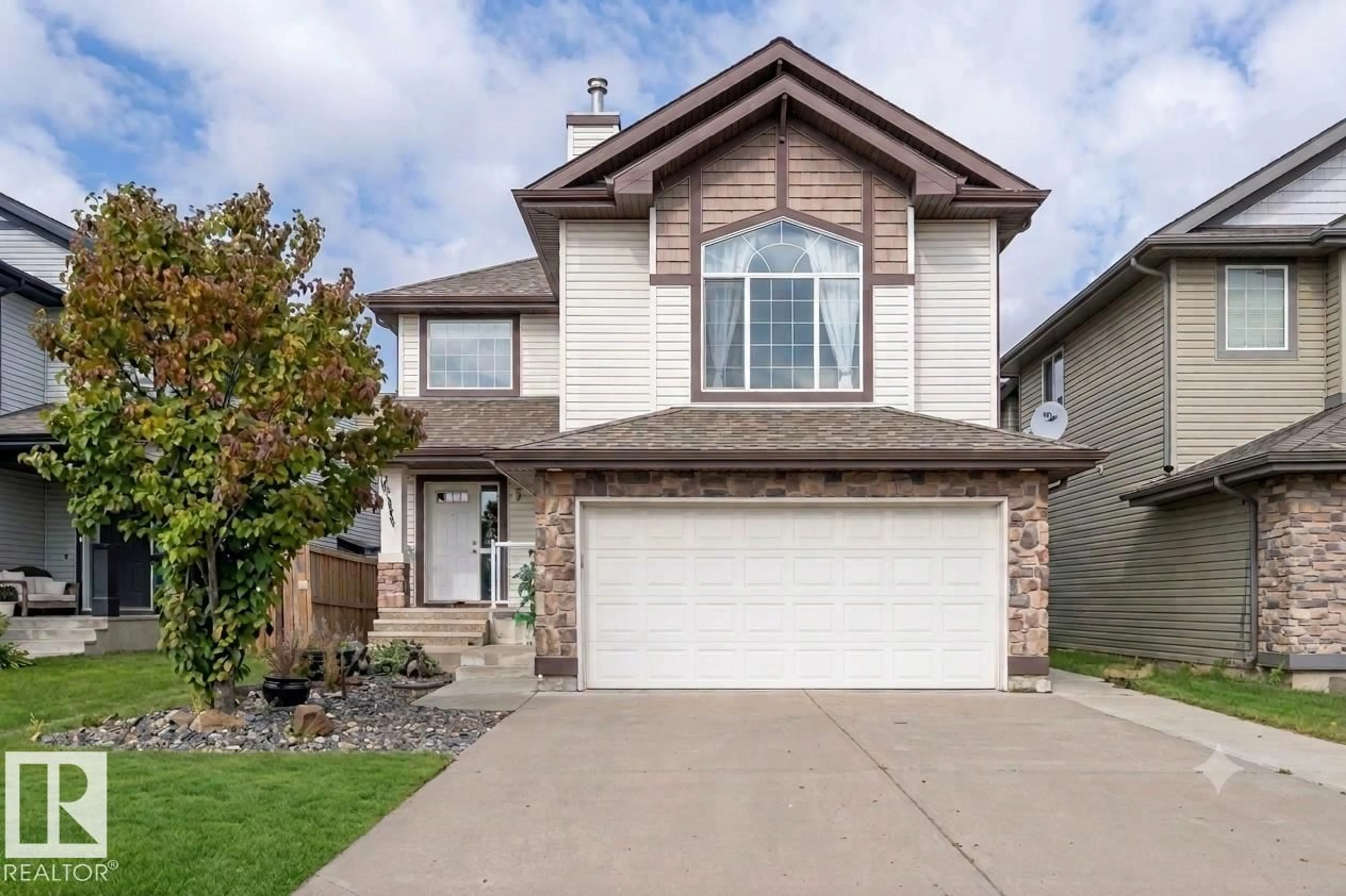 Home with brick exterior material, street for 16820 57 ST, Edmonton Alberta T5Y0K4
