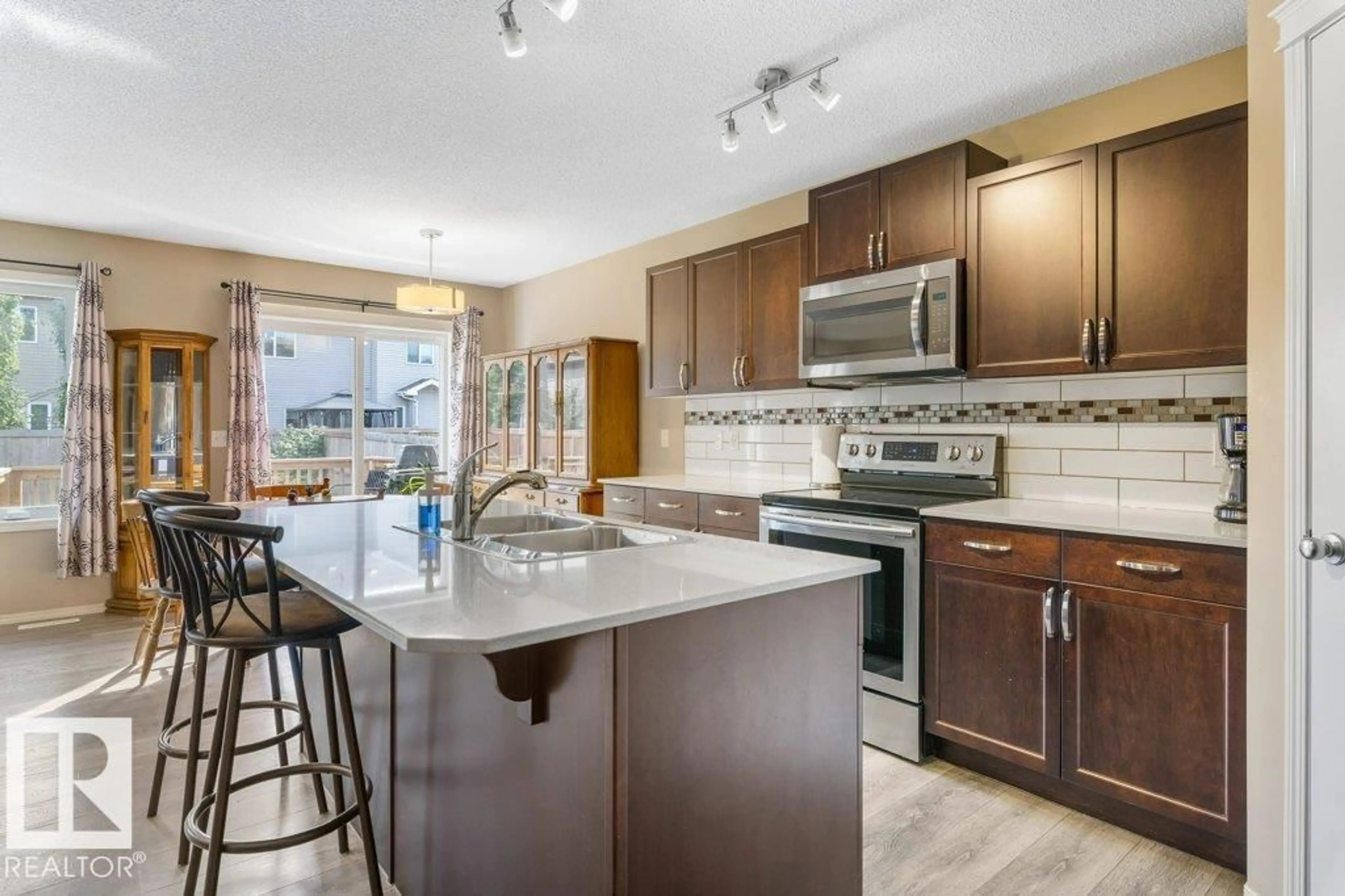 Open concept kitchen, ceramic/tile floor for NW - 12217 177 AV, Edmonton Alberta T5X0L1