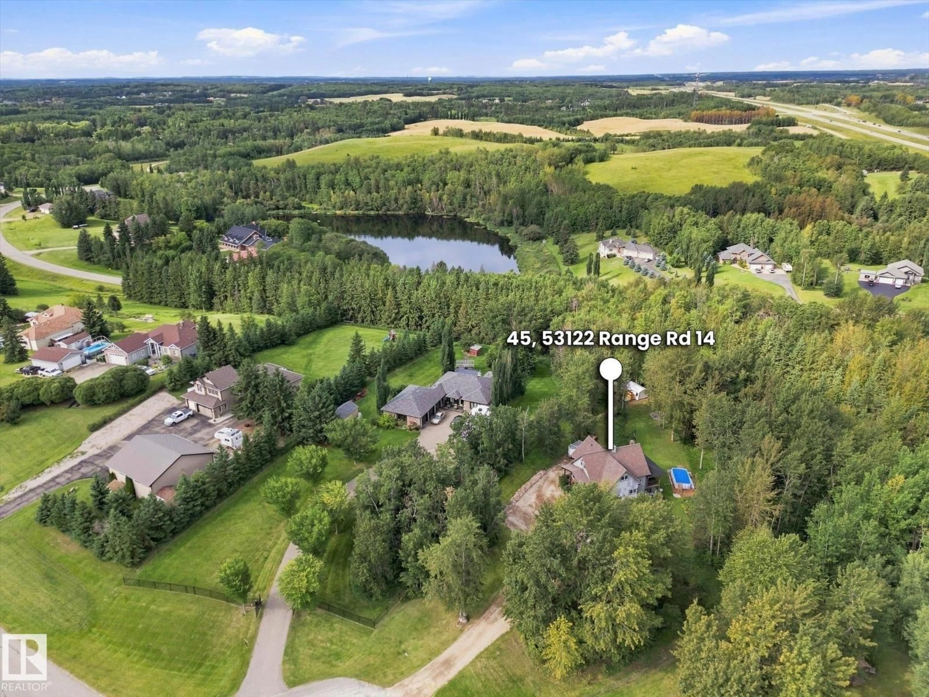 A pic from outside/outdoor area/front of a property/back of a property/a pic from drone, water/lake/river/ocean view for 45 53122 RGE ROAD 14, Rural Parkland County Alberta T7Y2T3