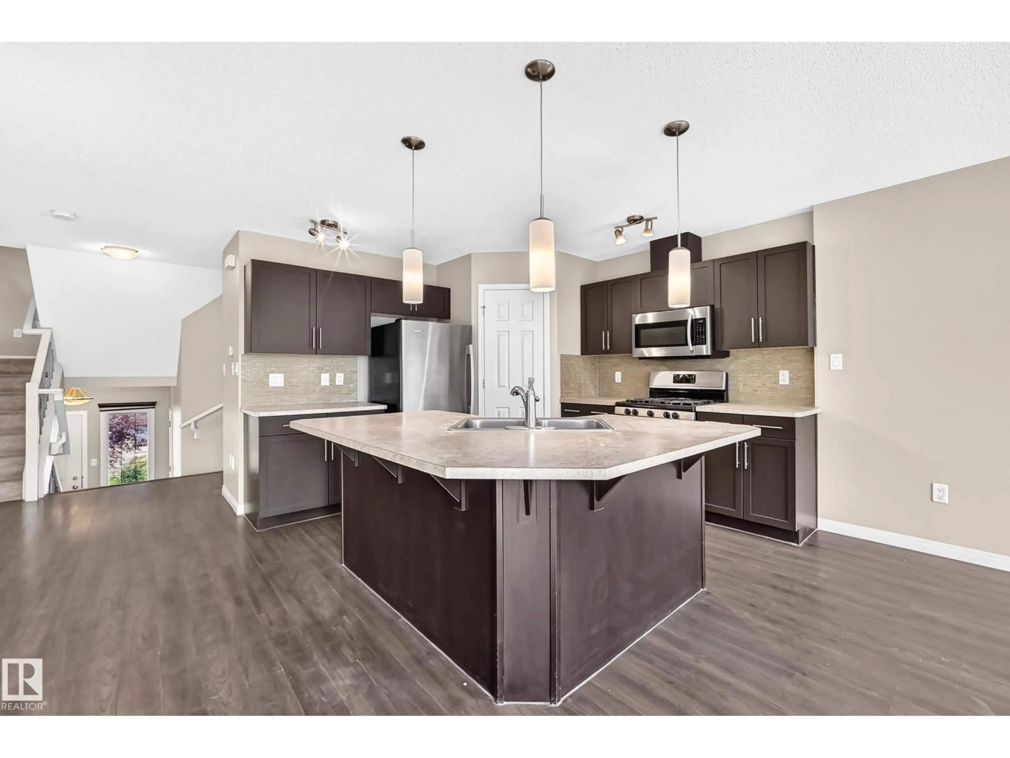 Open concept kitchen, unknown for 1941 CHAPMAN RD, Edmonton Alberta T6W0Y7