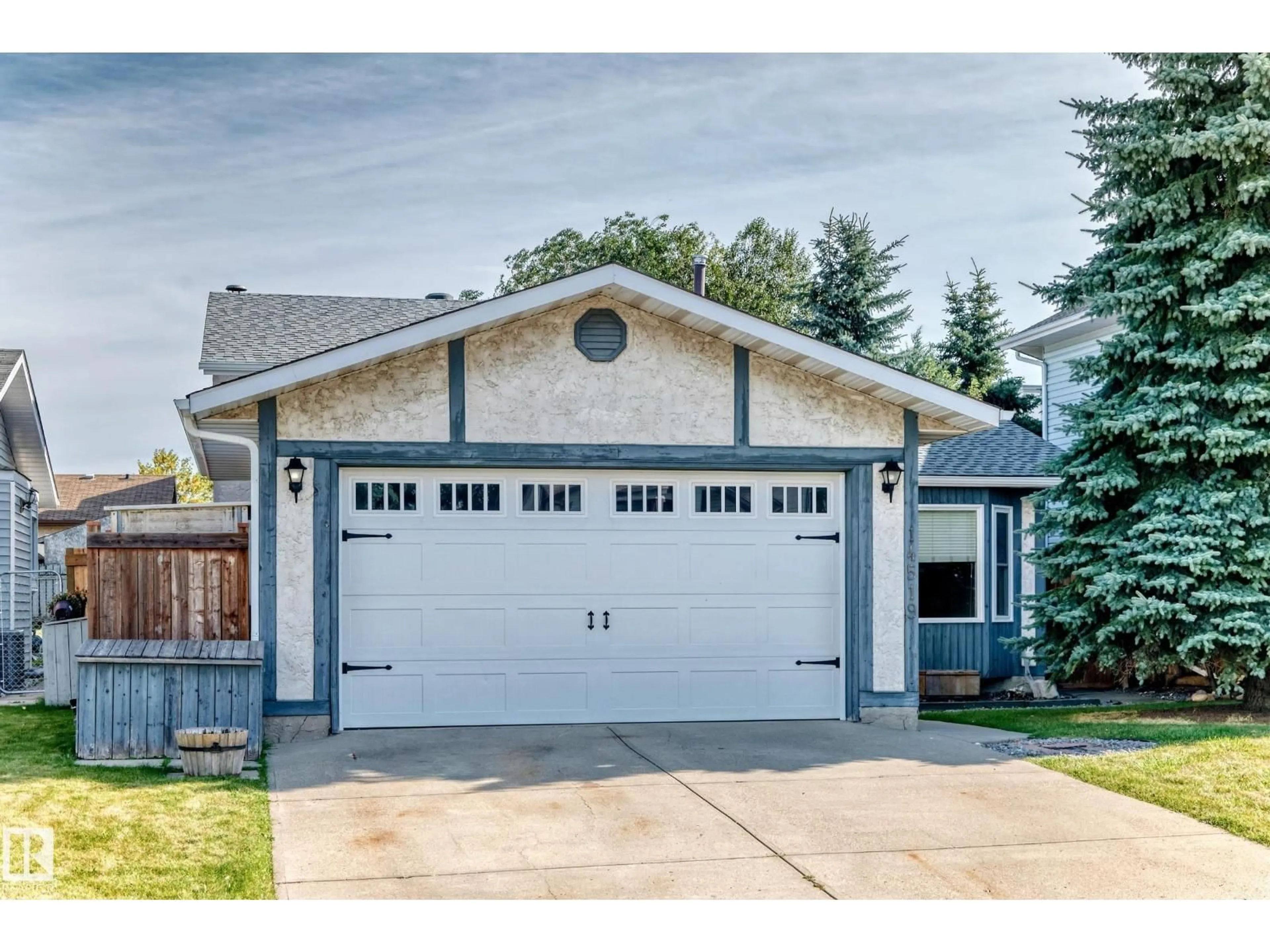 Home with vinyl exterior material, street for 14519 32 ST, Edmonton Alberta T5Y2L2