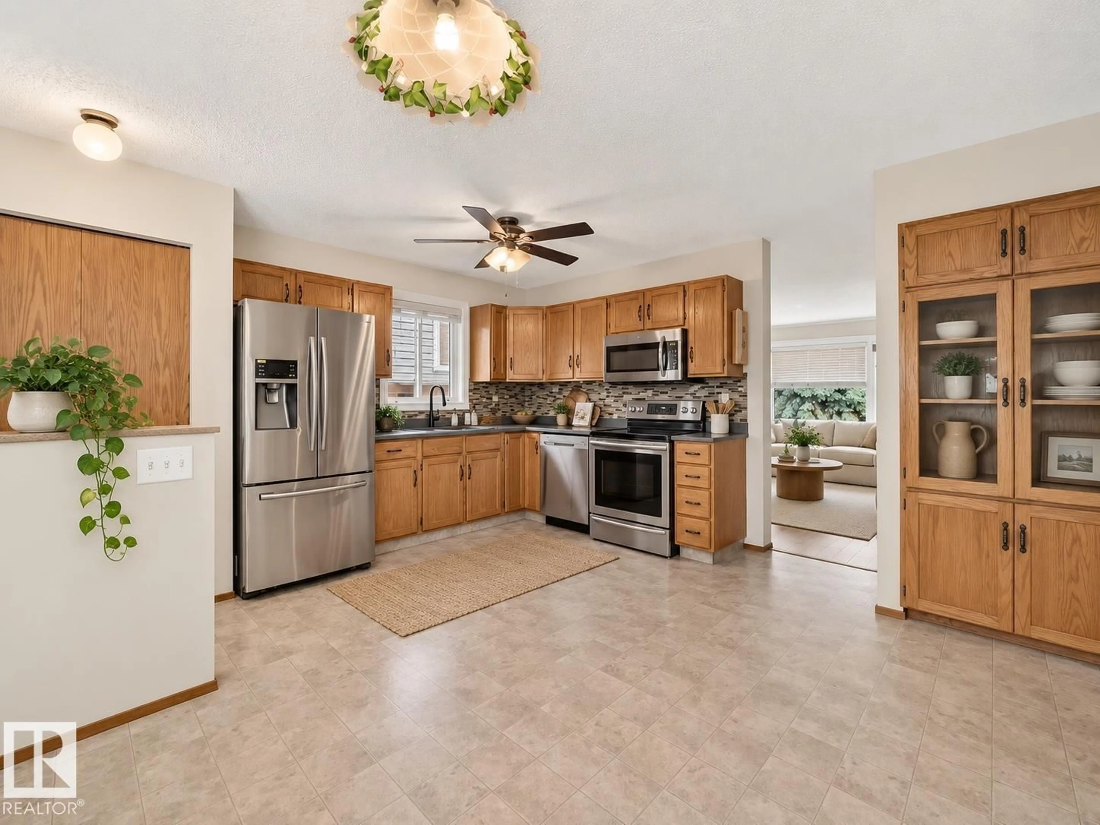 Open concept kitchen, ceramic/tile floor for 14519 32 ST, Edmonton Alberta T5Y2L2