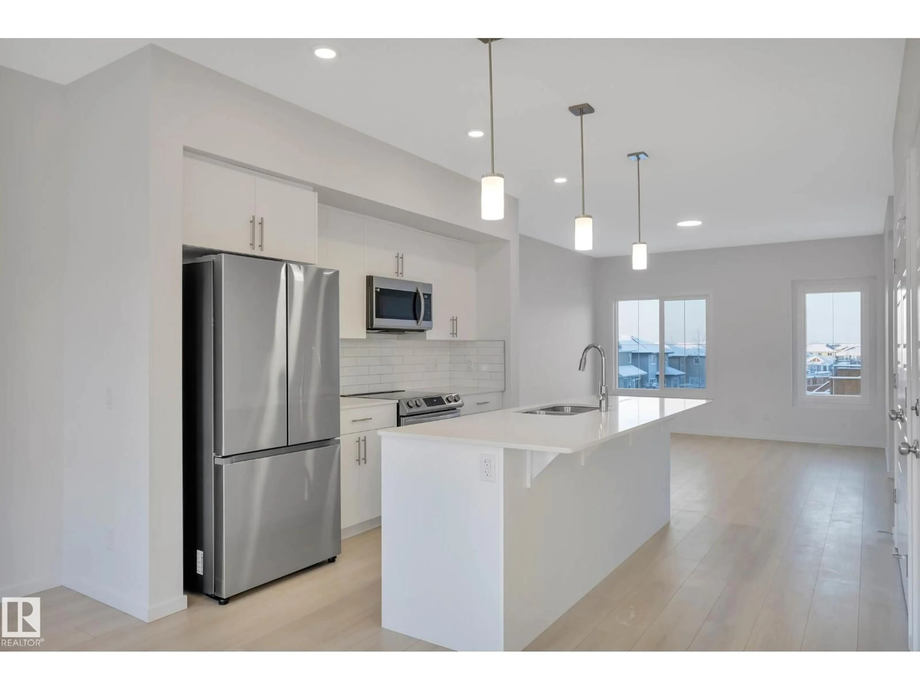 Open concept kitchen, unknown for SW - 5239 - 5245 21A AV, Edmonton Alberta T6X1X5