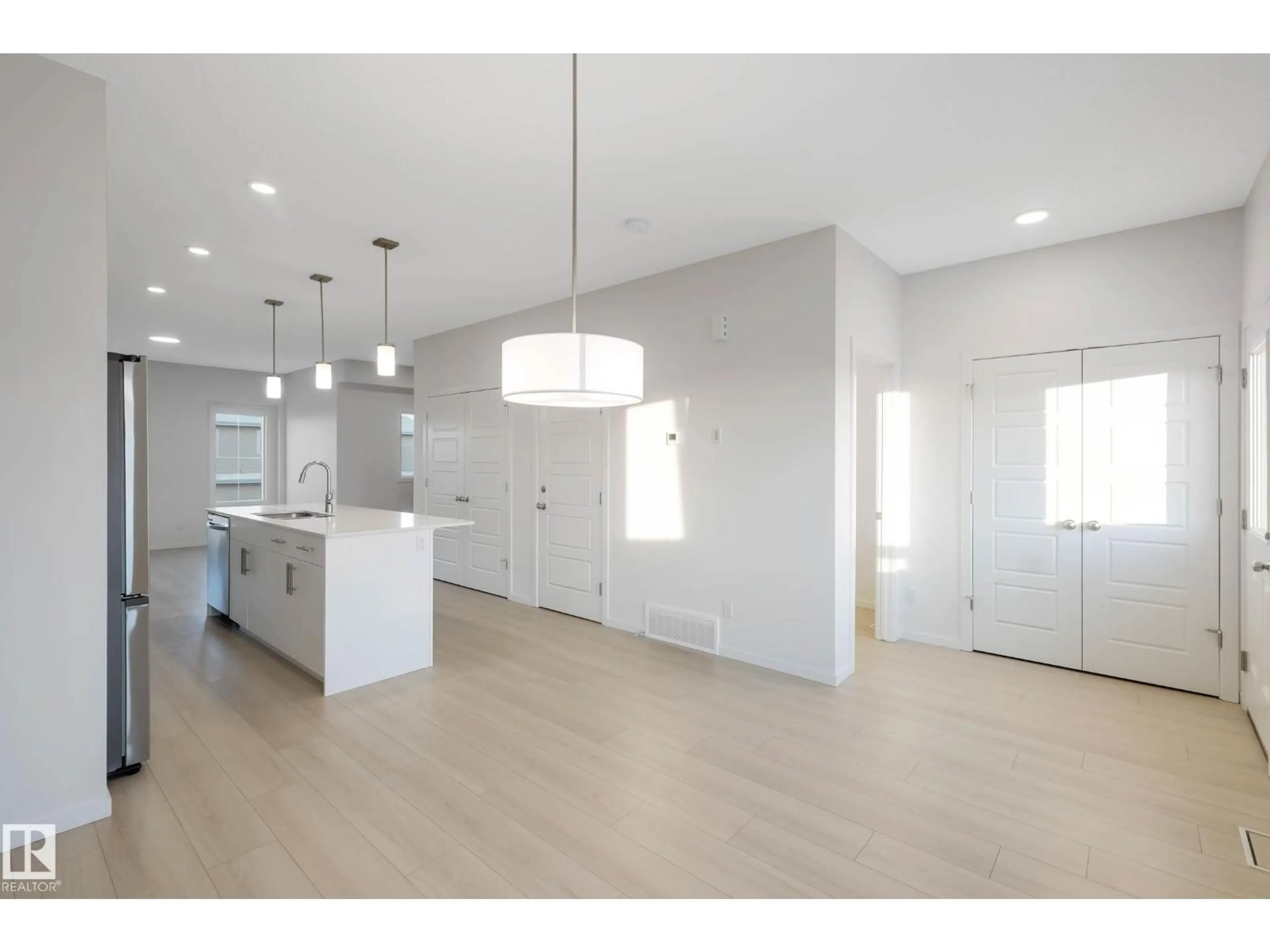 Open concept kitchen, unknown for SW - 5239 - 5245 21A AV, Edmonton Alberta T6X1X5