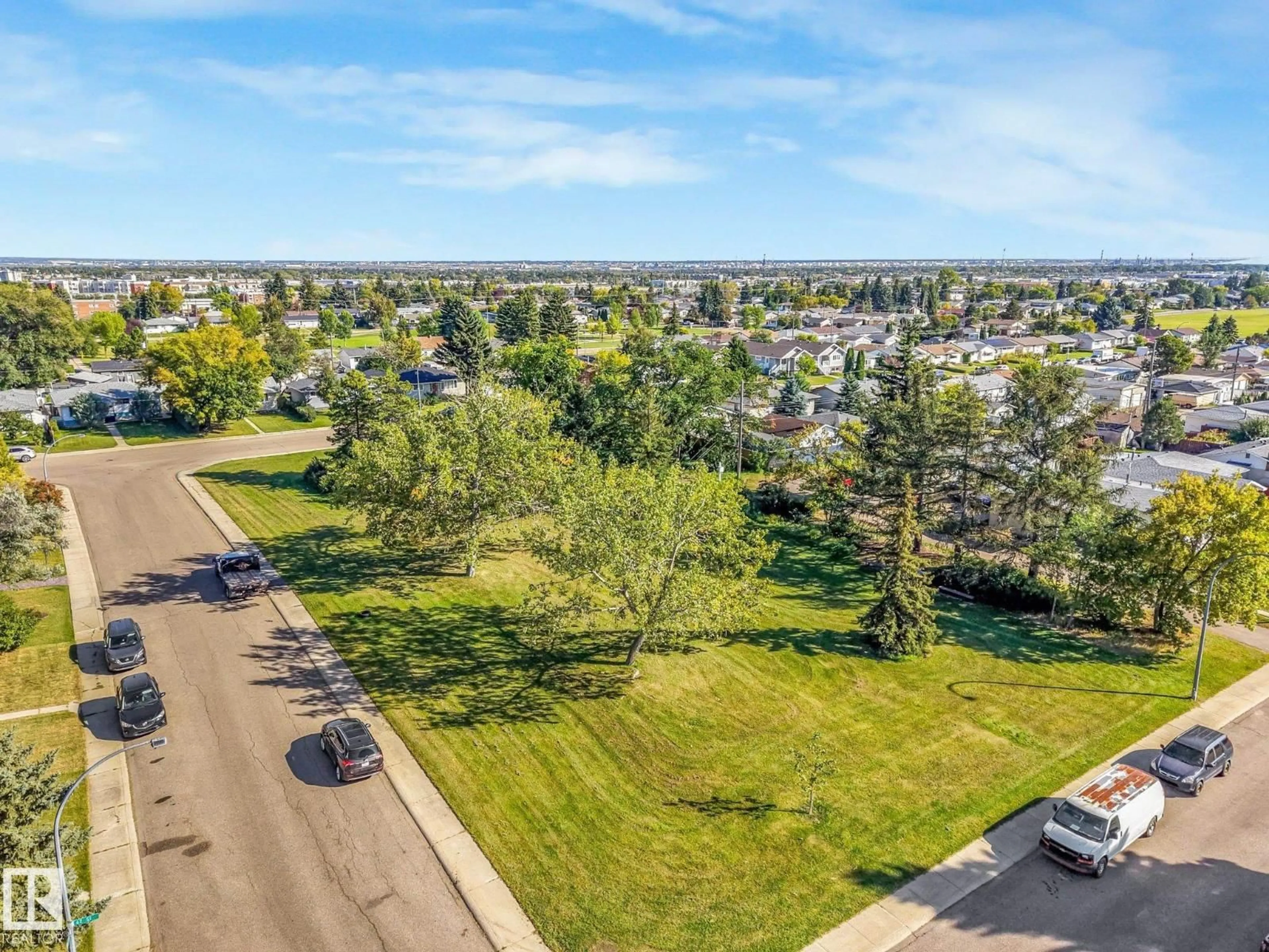 A pic from outside/outdoor area/front of a property/back of a property/a pic from drone, unknown for NW - 13524 62 ST, Edmonton Alberta T5A0V9