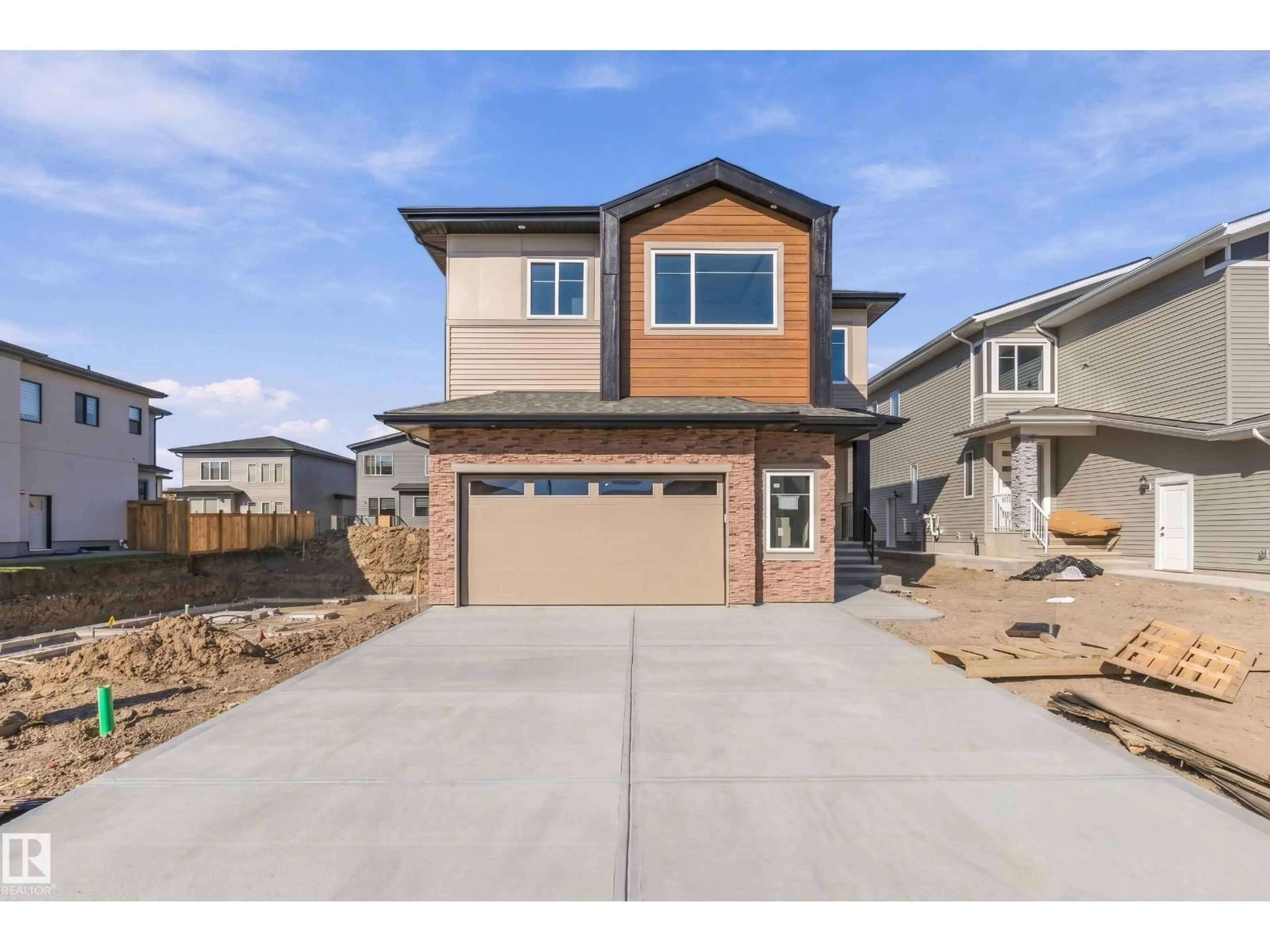 Home with brick exterior material, street for 2720 63 AV, Rural Leduc County Alberta T4X3A4