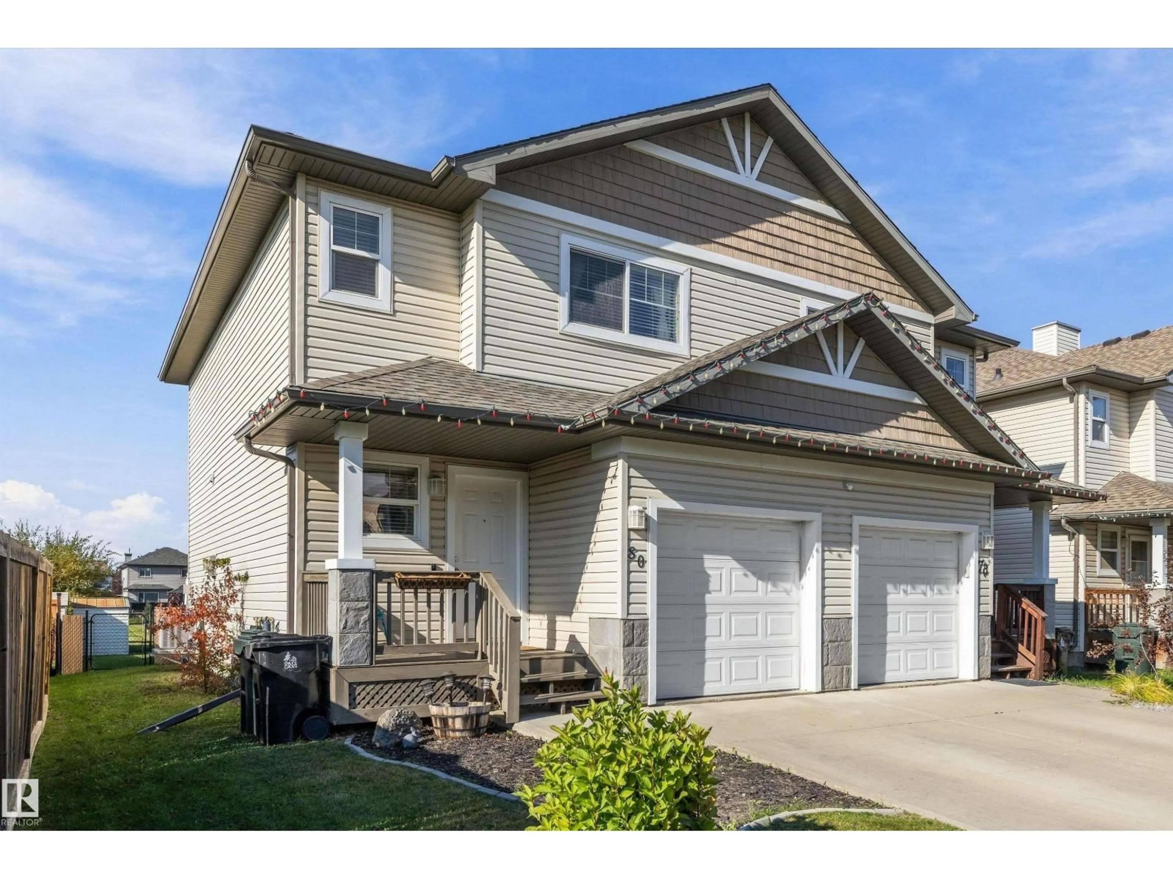 Home with vinyl exterior material, street for 80 HARTWICK LD, Spruce Grove Alberta T7X0A5