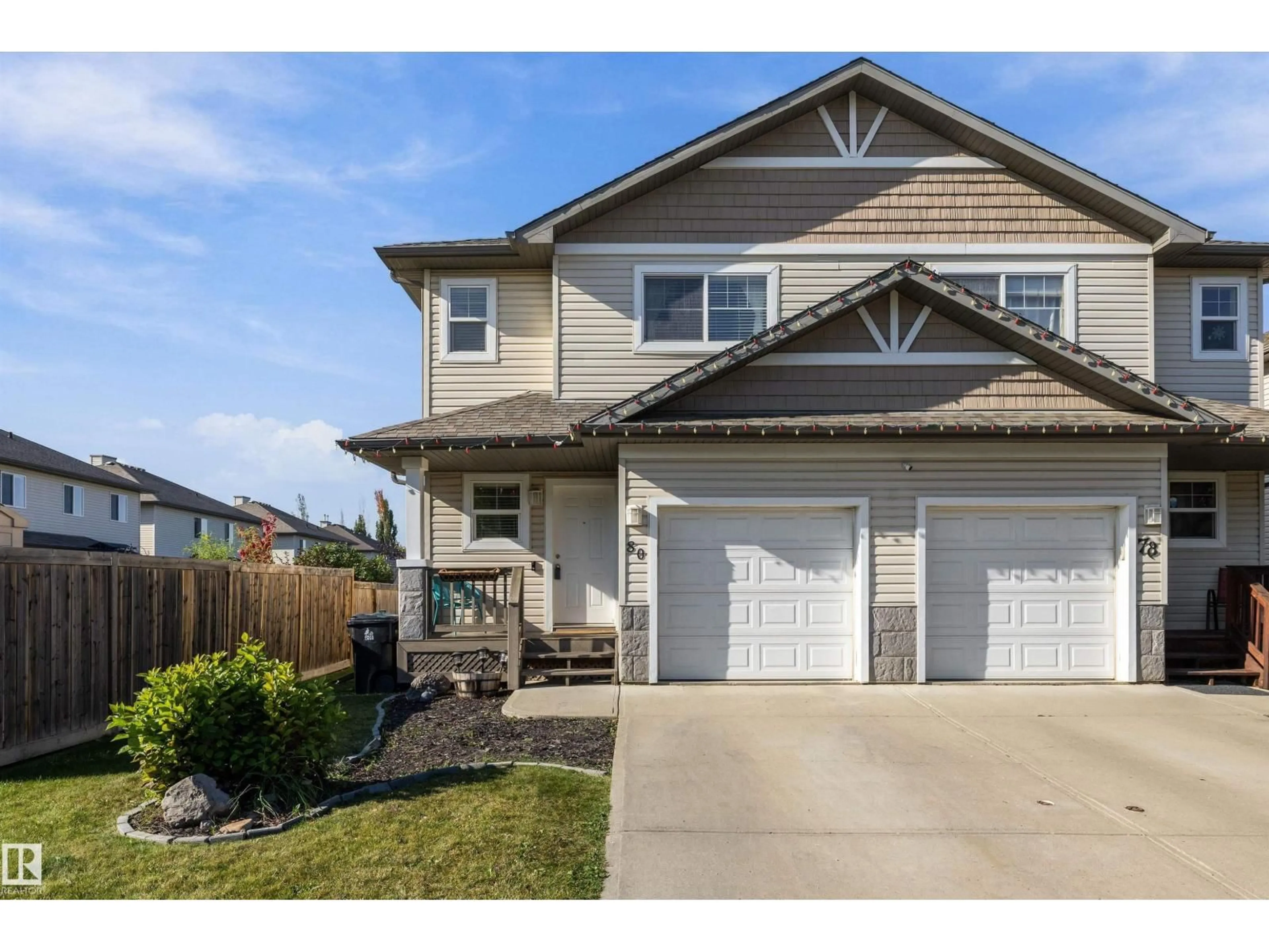 Home with vinyl exterior material, street for 80 HARTWICK LD, Spruce Grove Alberta T7X0A5